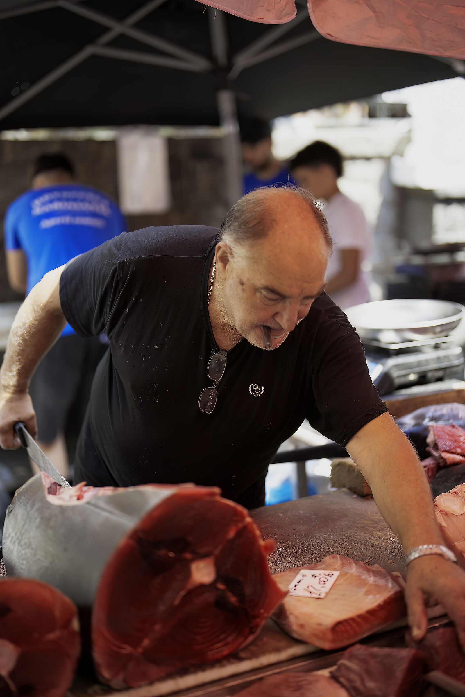 Fish market in Catania Cutting of the catch
