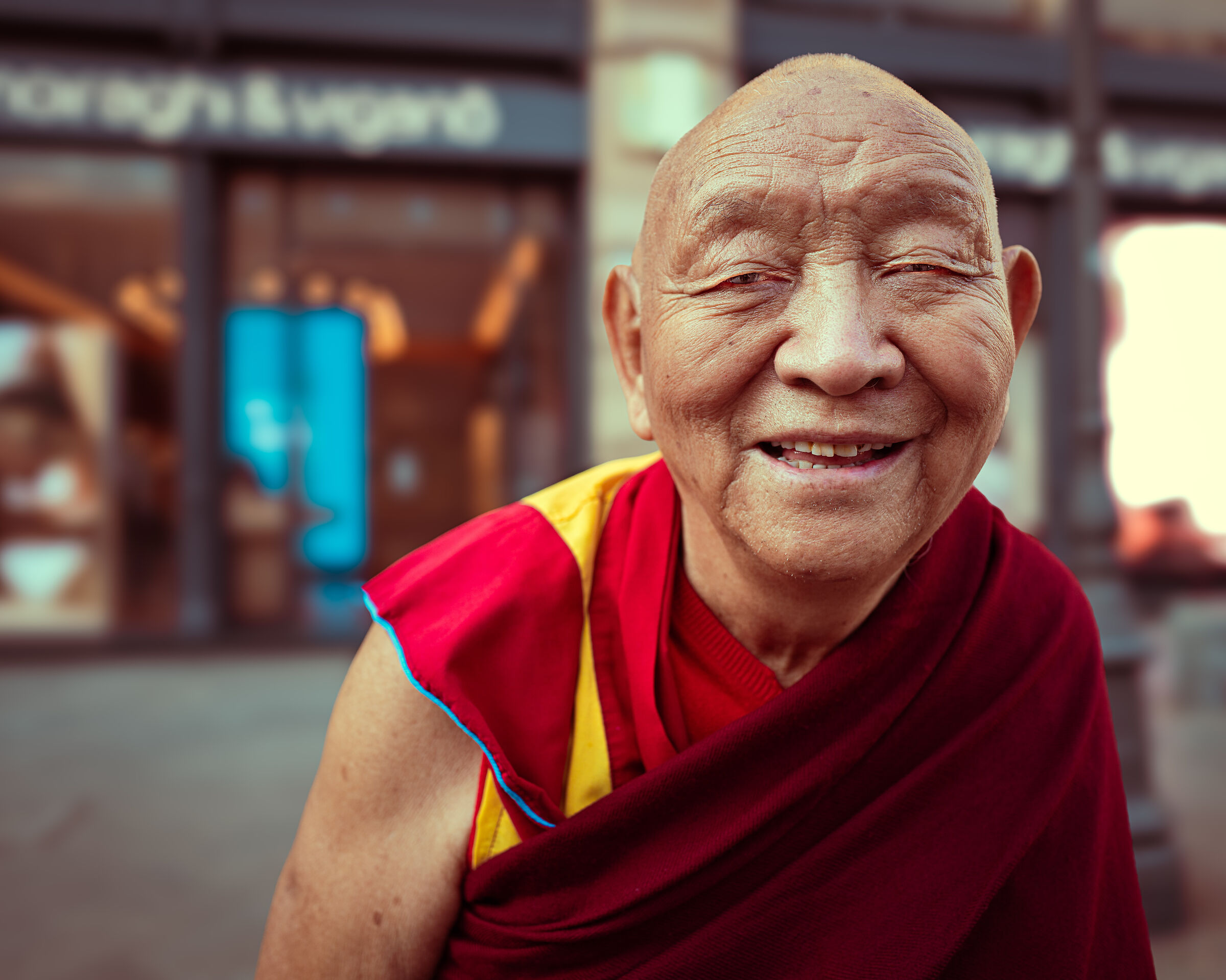 An elderly Tibetan monk around Milan