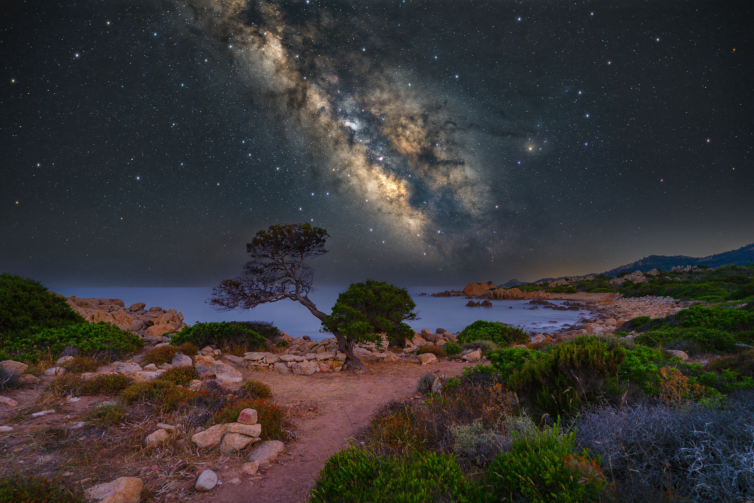 Capo Comino by night
