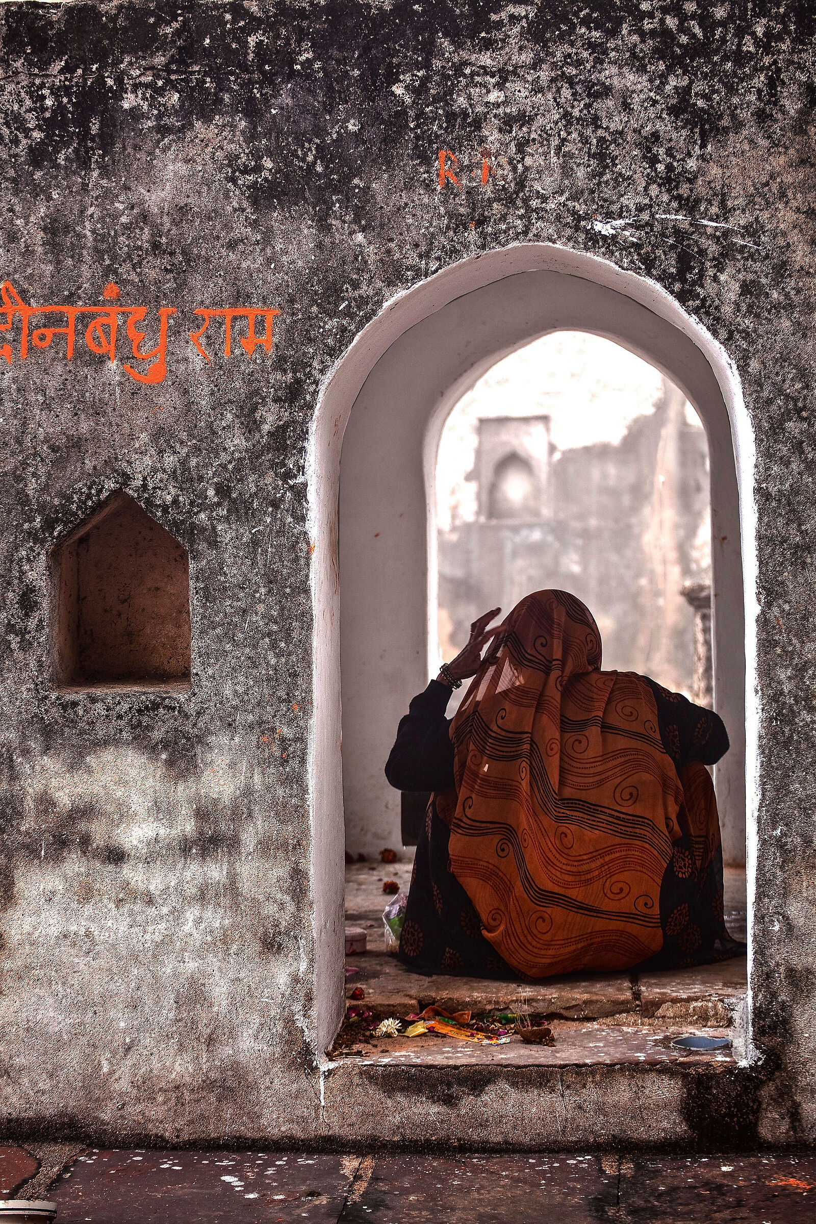 Woman in prayer, India