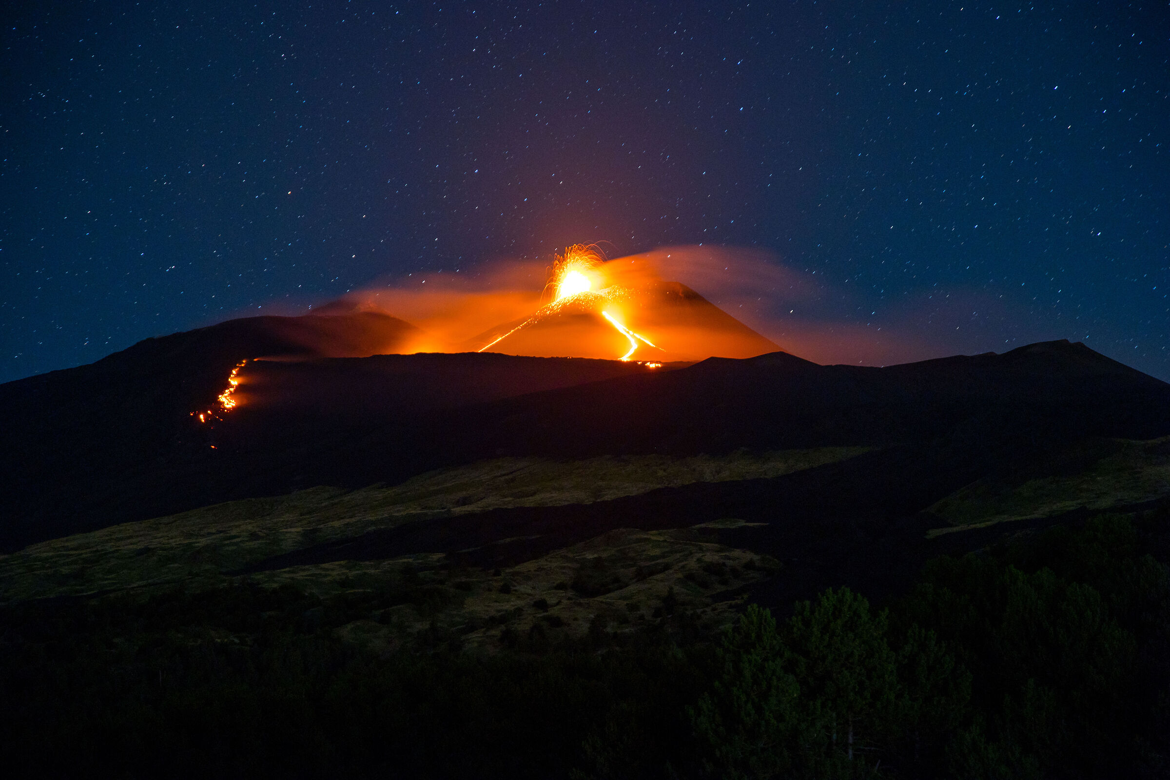 Eruption under a starry sky
