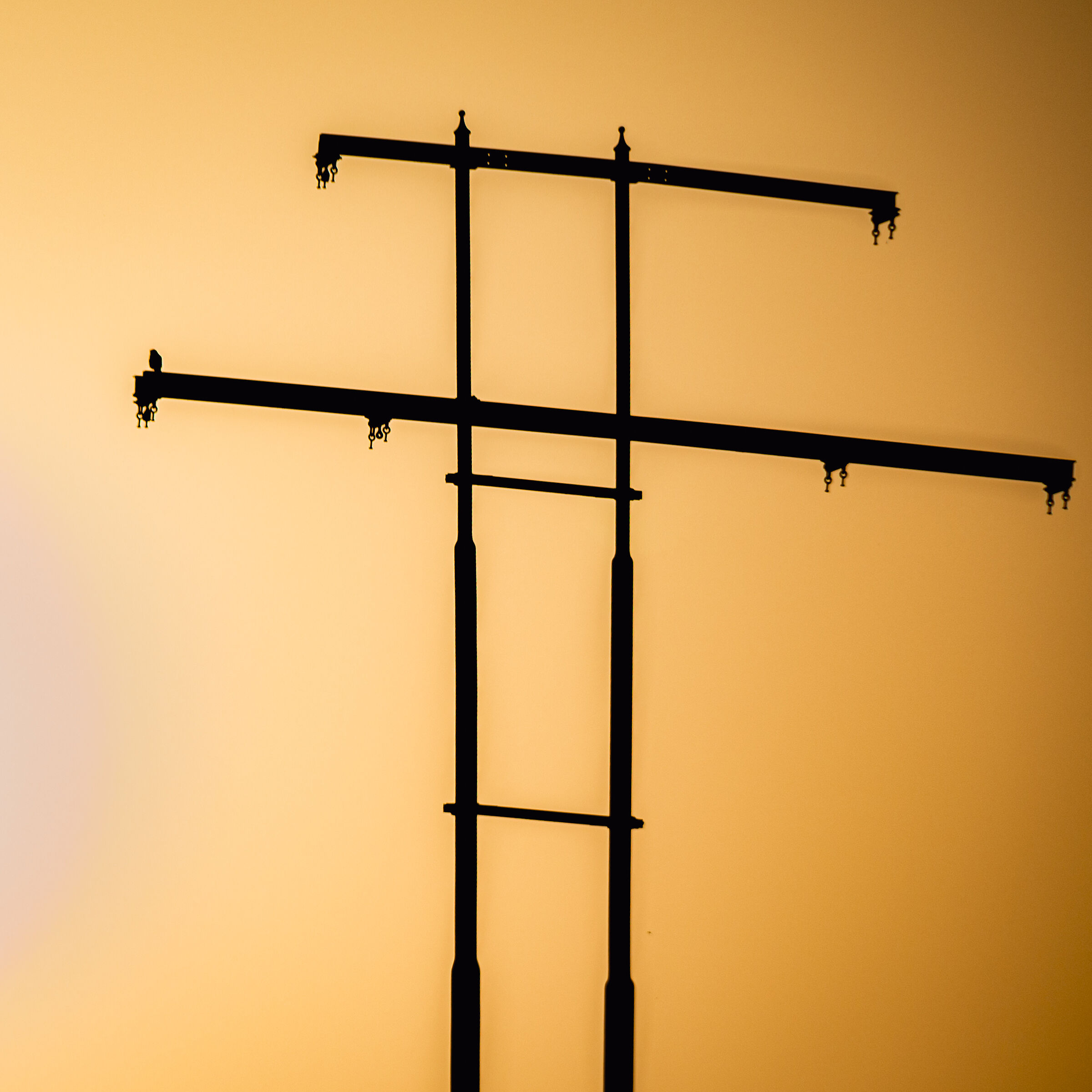 Resting where the wires once sang