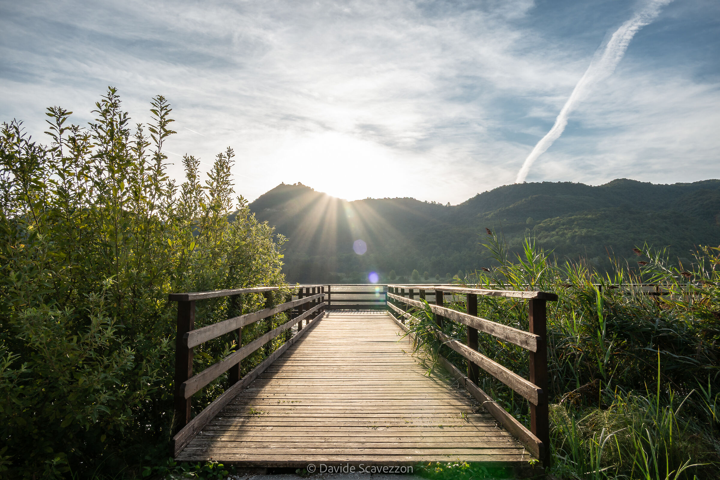 The sun rises from the mountain