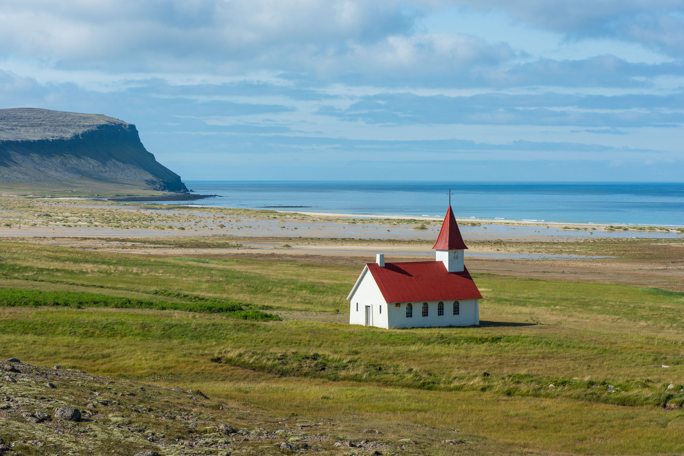 The small church with the red roof