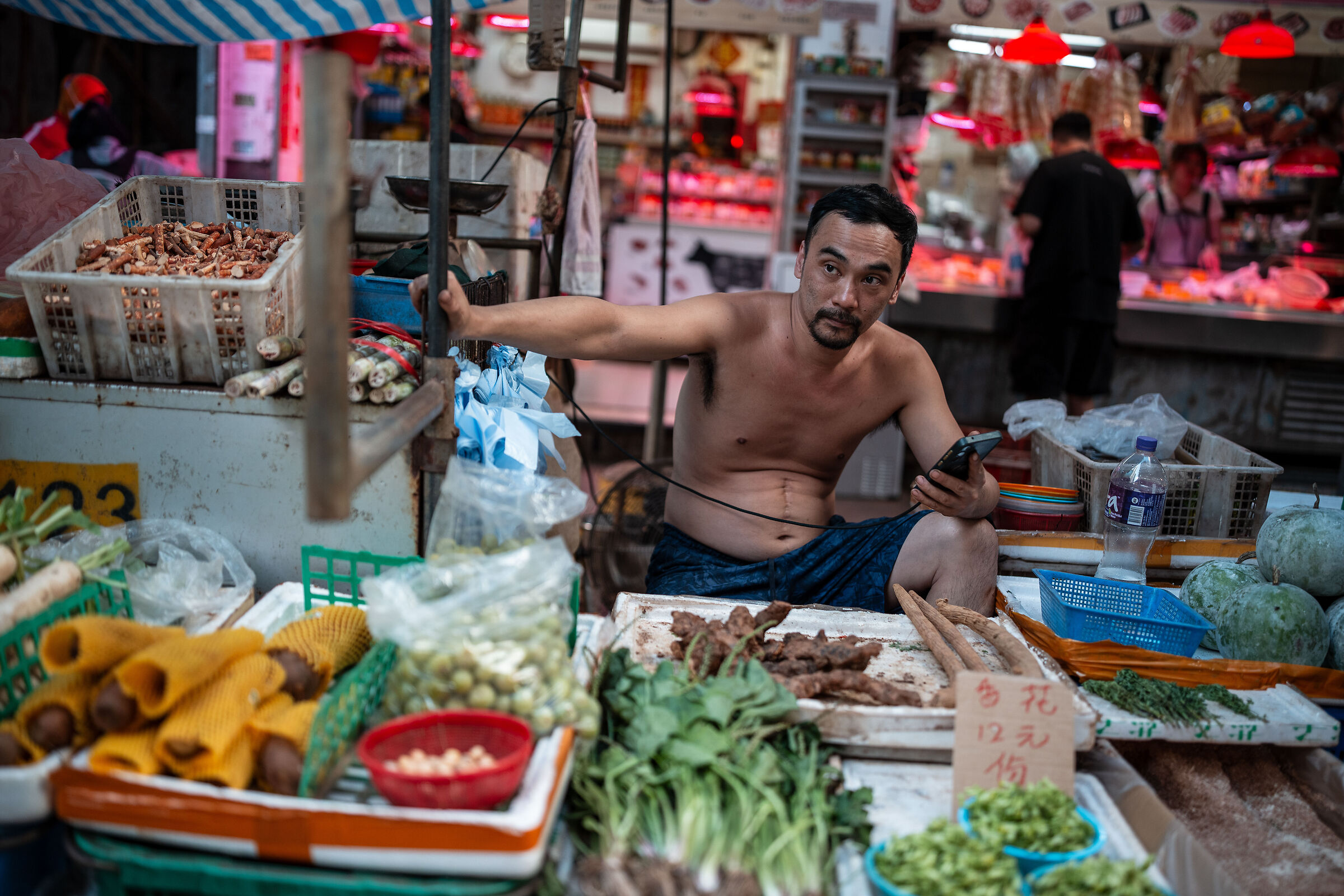 Between the phone and the customer