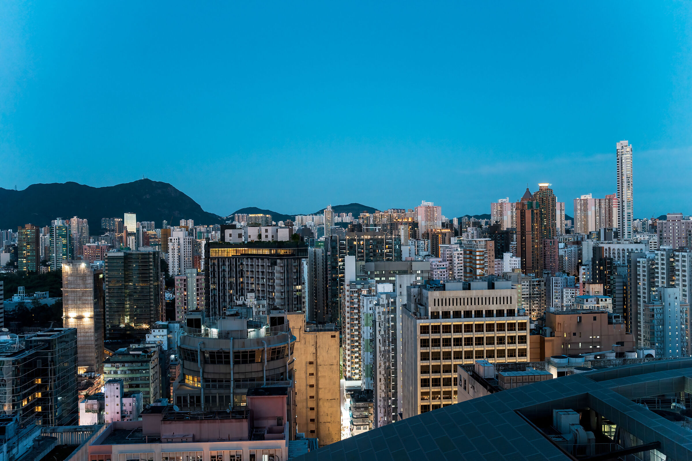Hong Kong skyline now blue from my room in Mongkok