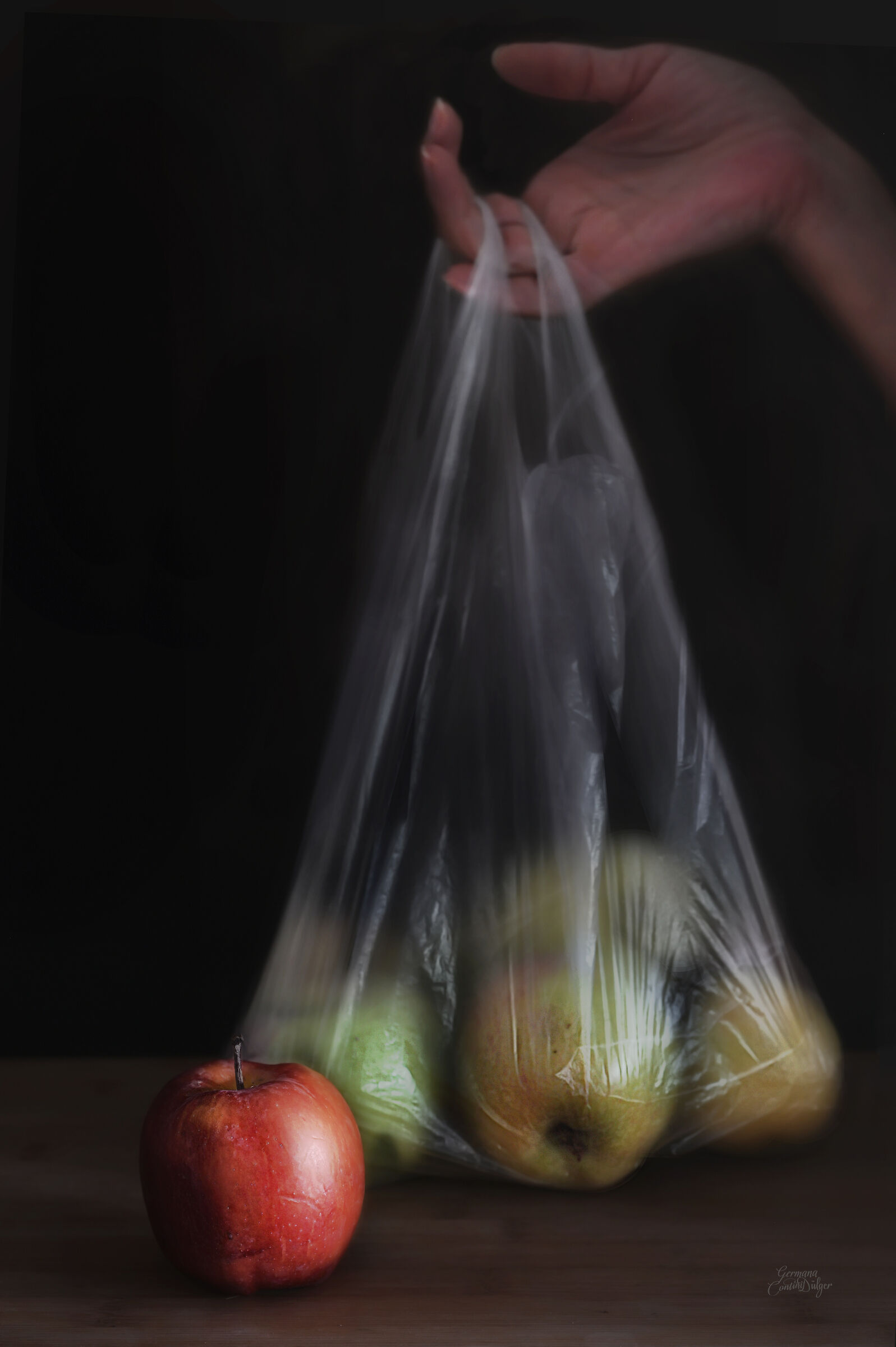 Apples in plastic bag