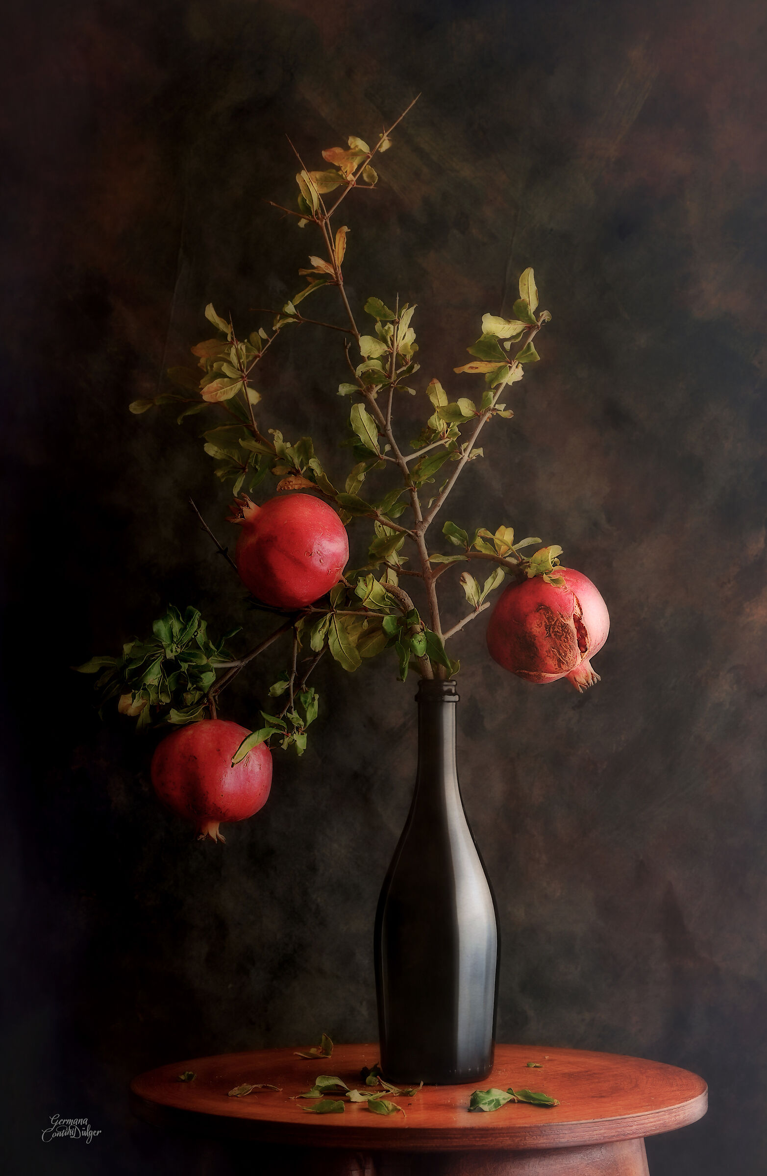 Bottle and pomegranates