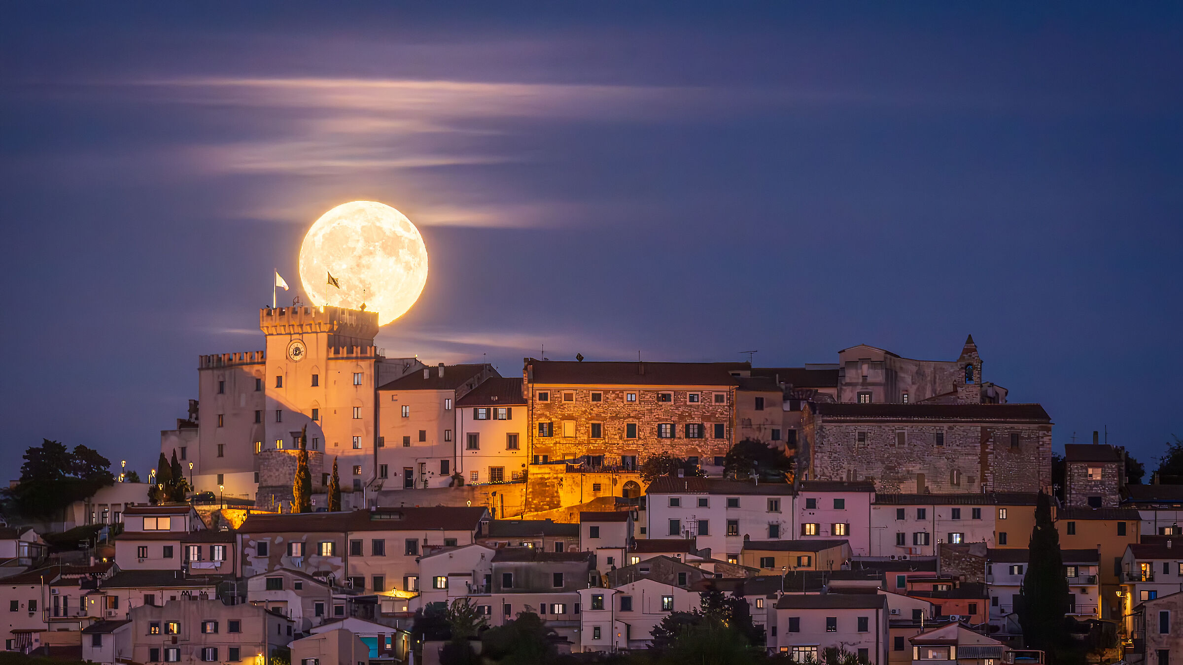 The hunter's full moon behind the castle
