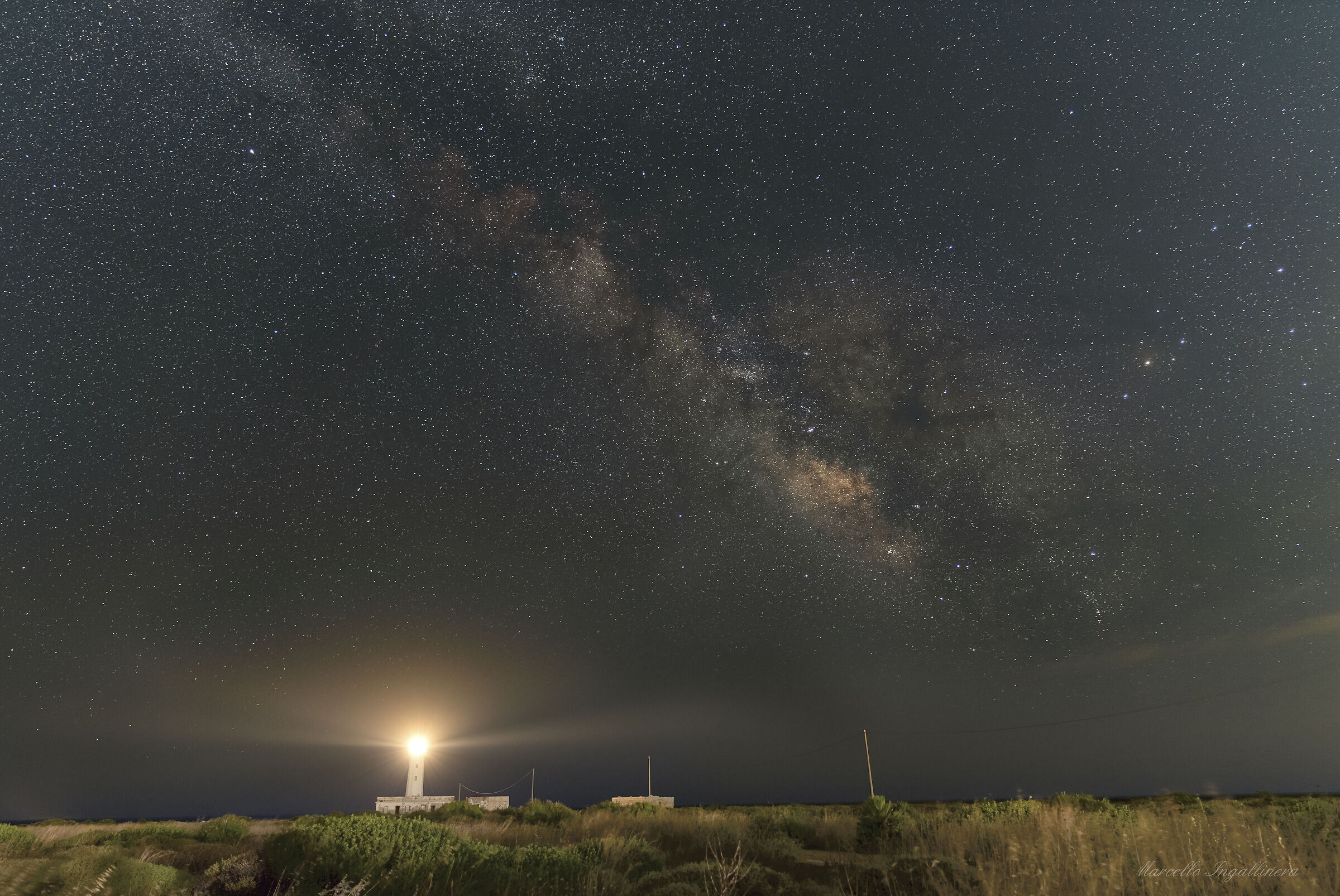 Milky Way on the lighthouse of Capo Murro di porco al Plemmi...