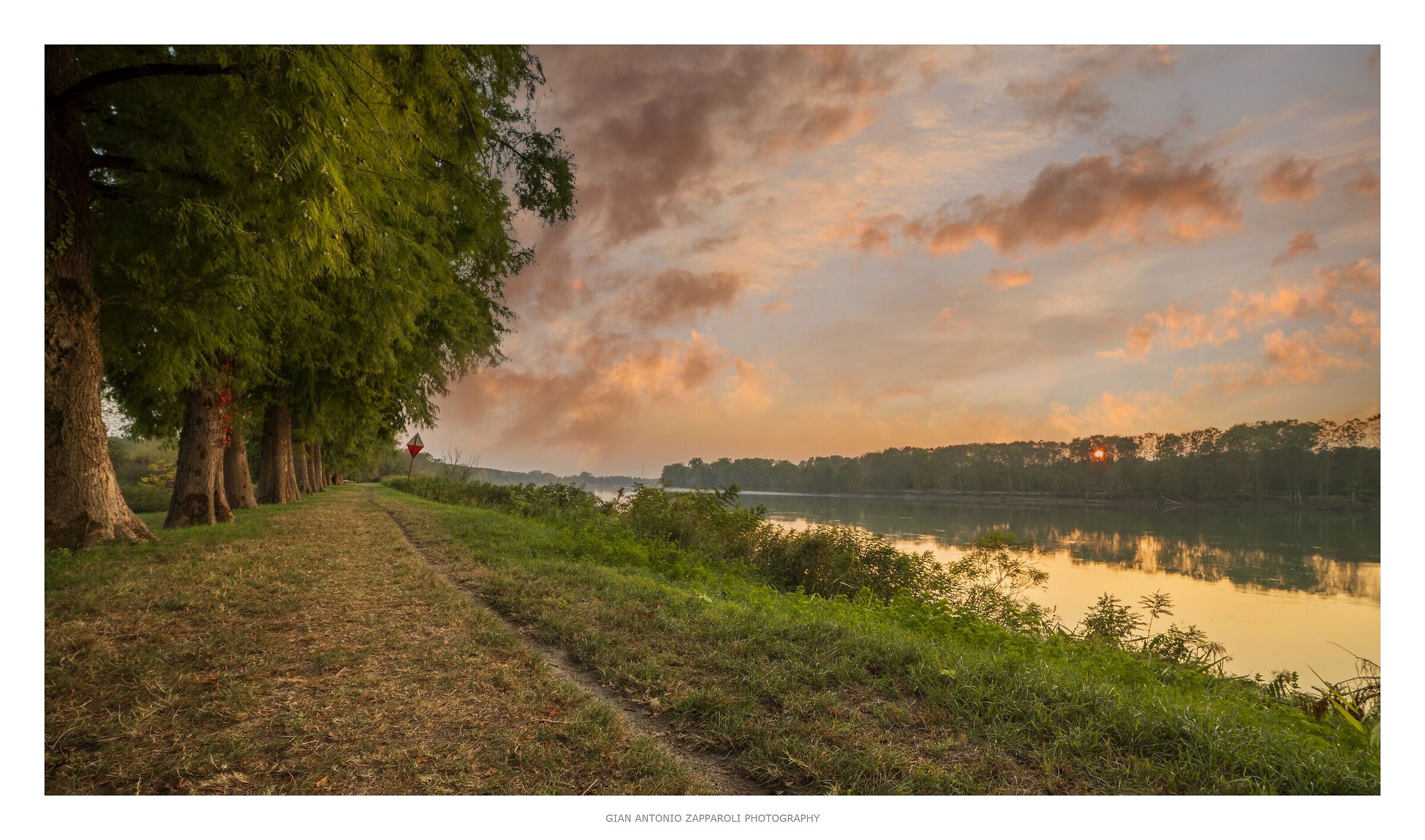 On the bank of the Po at sunset