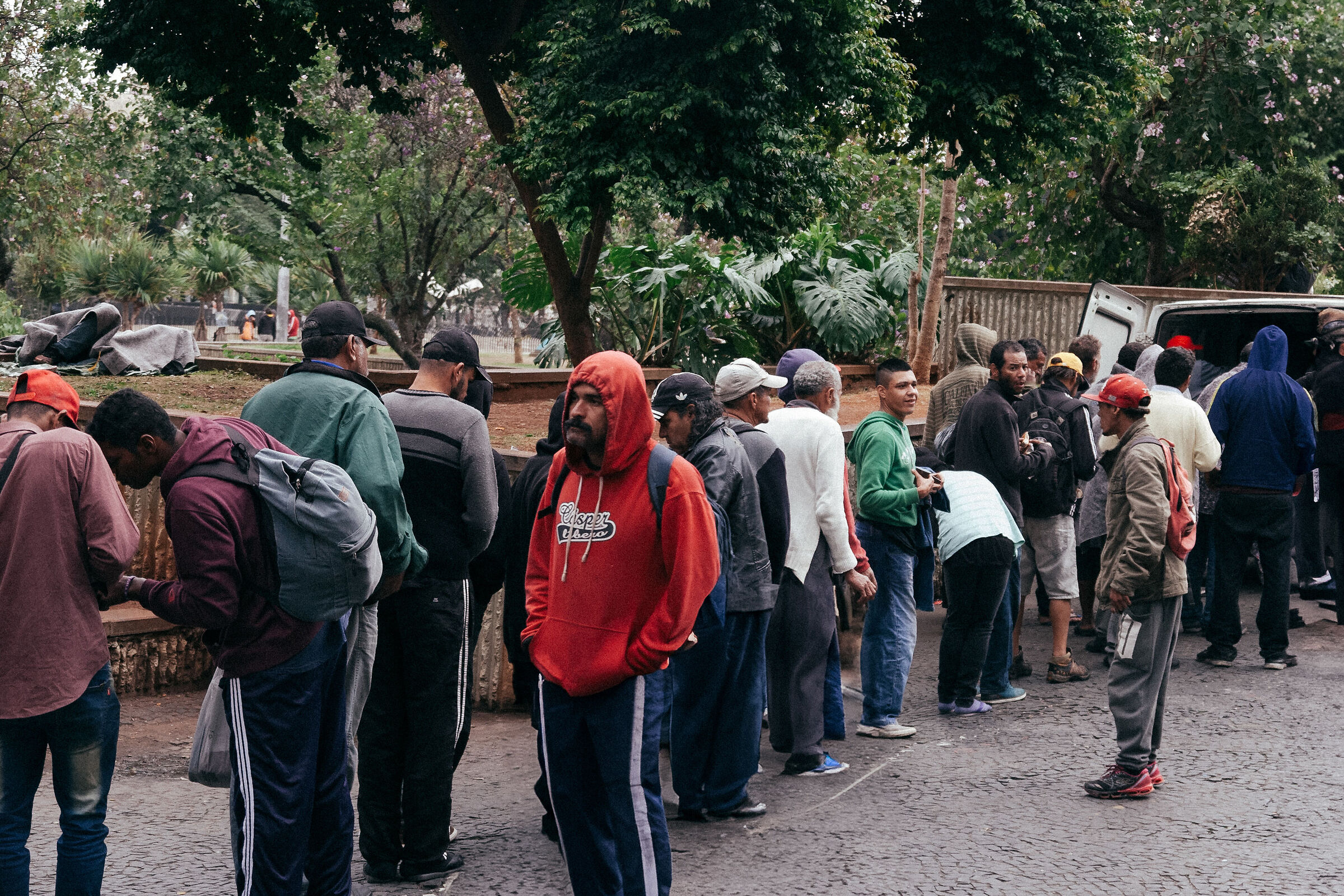 Lining up for a blanket and hot coffee