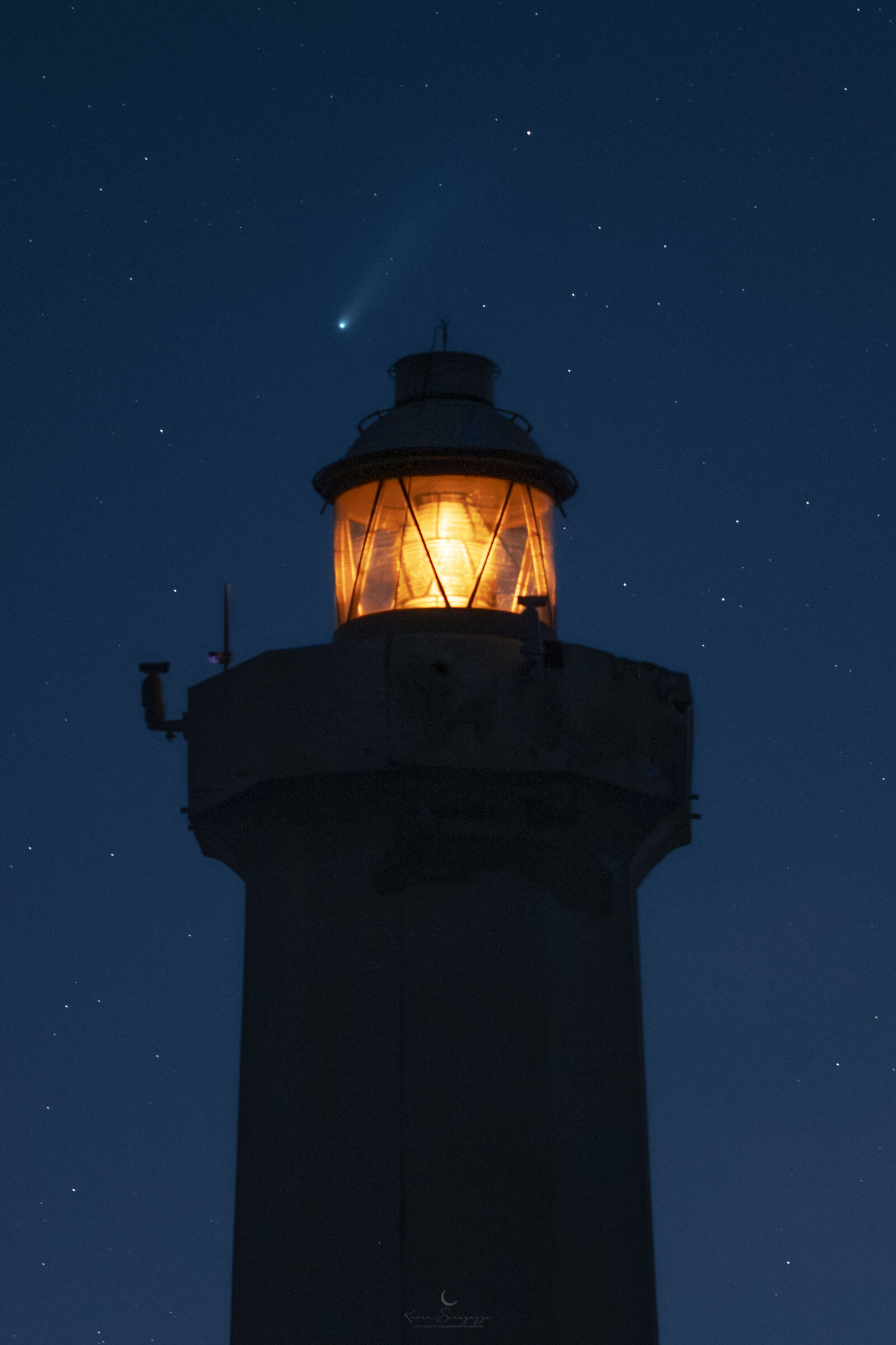 Comet Lemmon towards the Capo Murro di Porco lighthouse