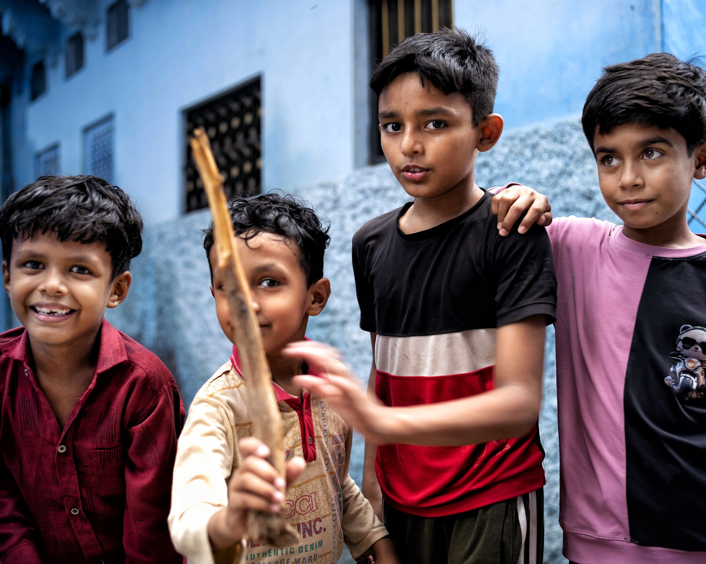 Young people in the alleys of the blue city.