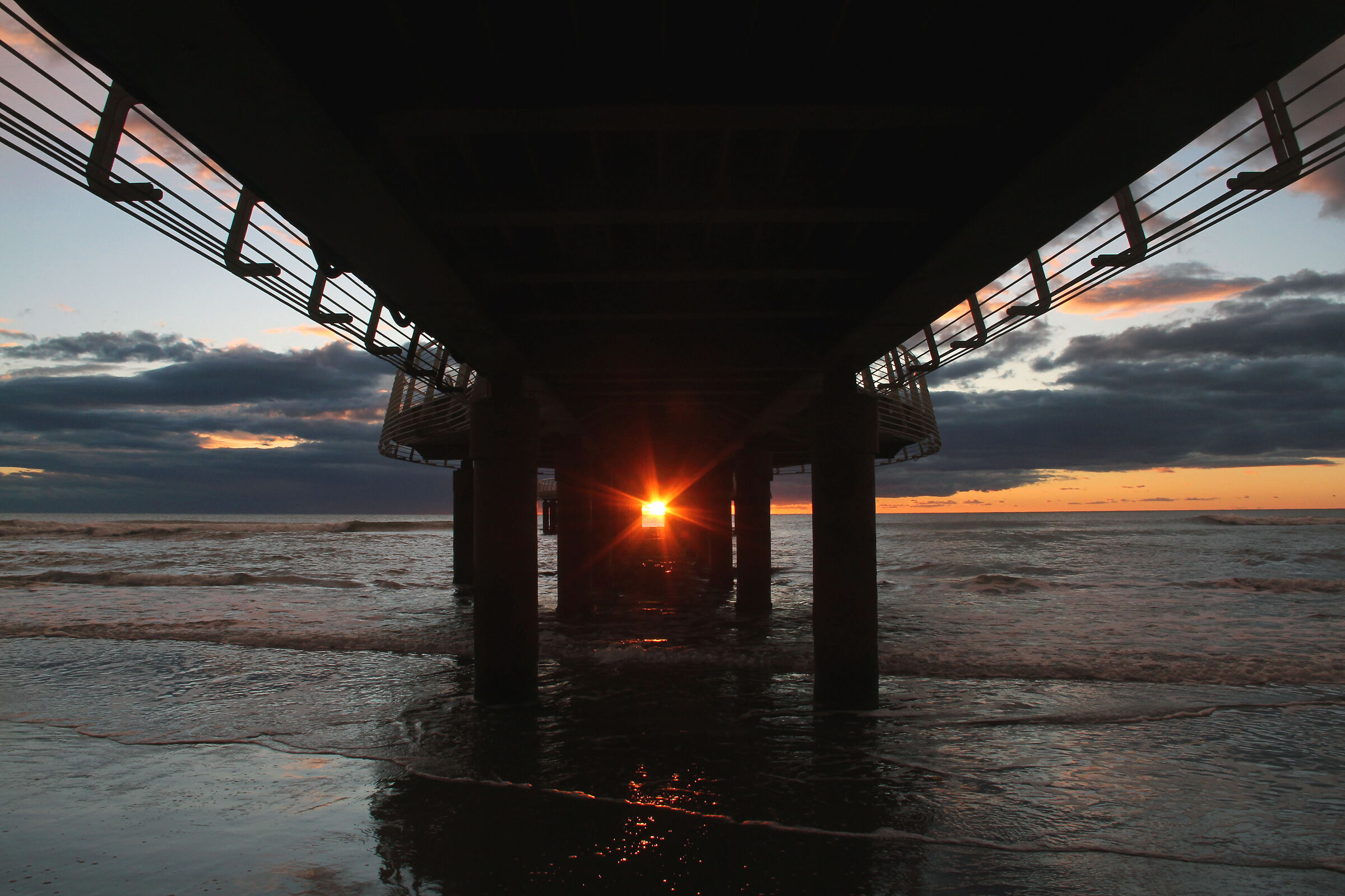 Sunset under the pier