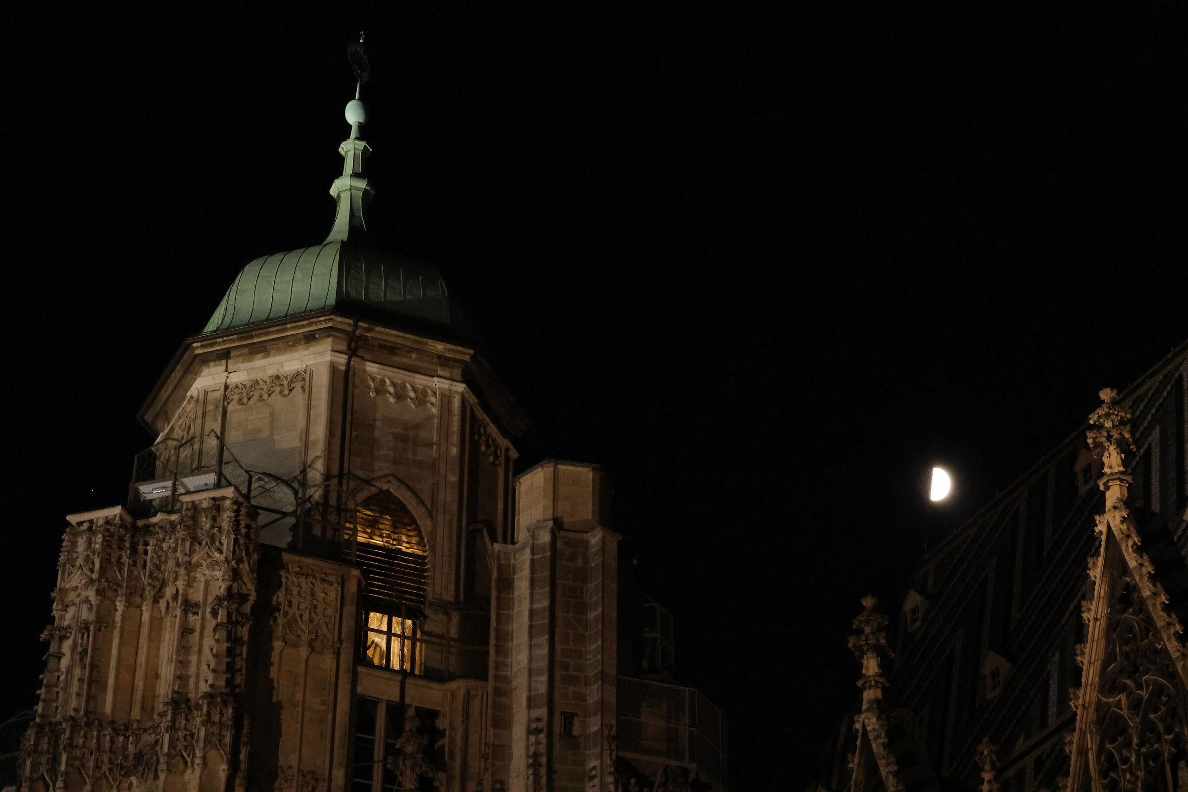 Half moon between rooftops