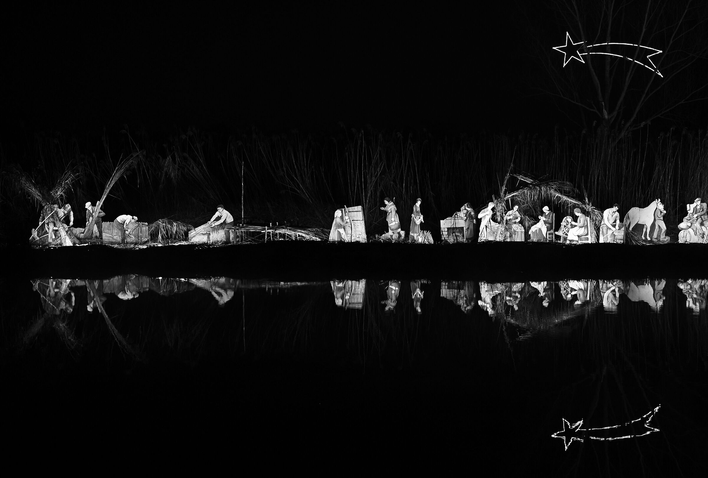 Nativity scene on the river in BW