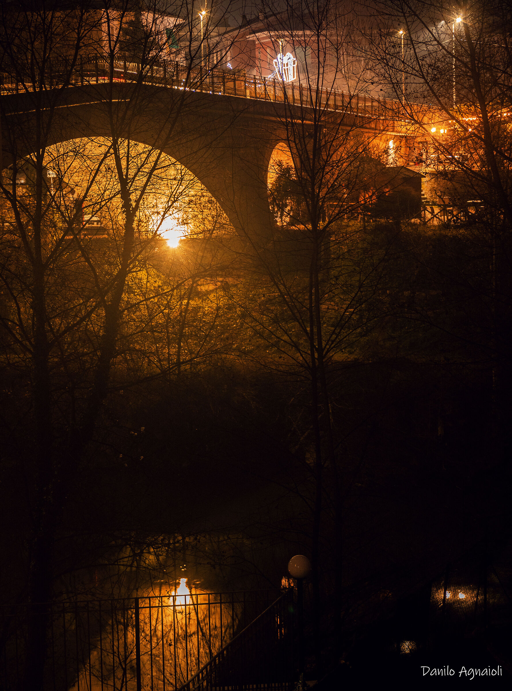 The river passes, the bridge remembers.