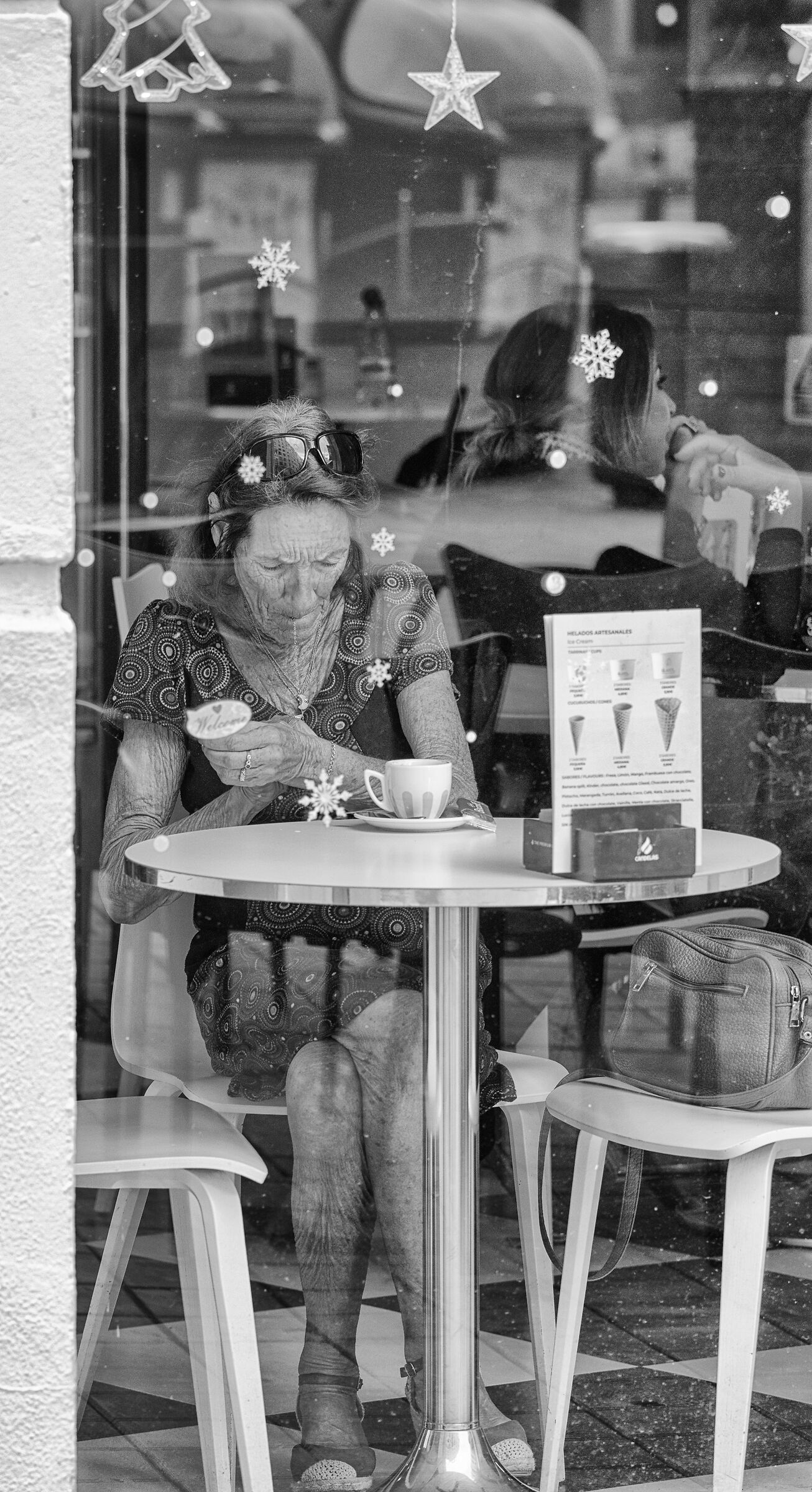 ... Two women at a bar...