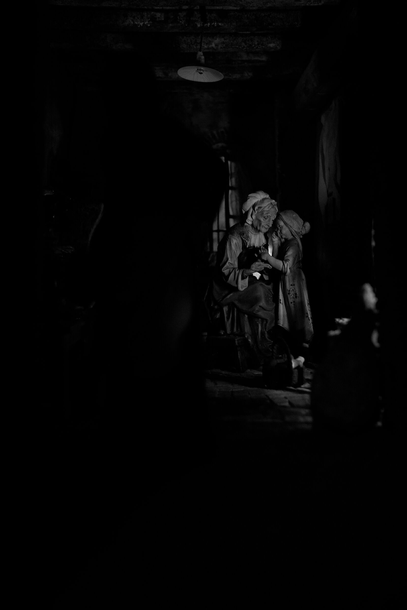 Grandmother and granddaughter of the nativity scene