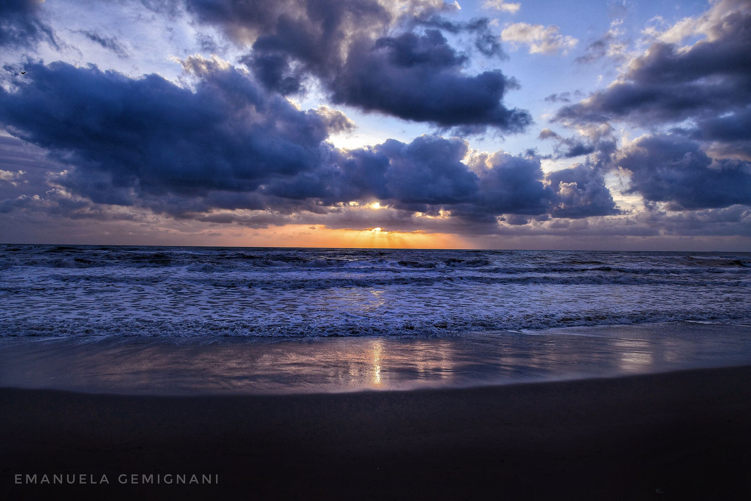 The sea guards the sunset