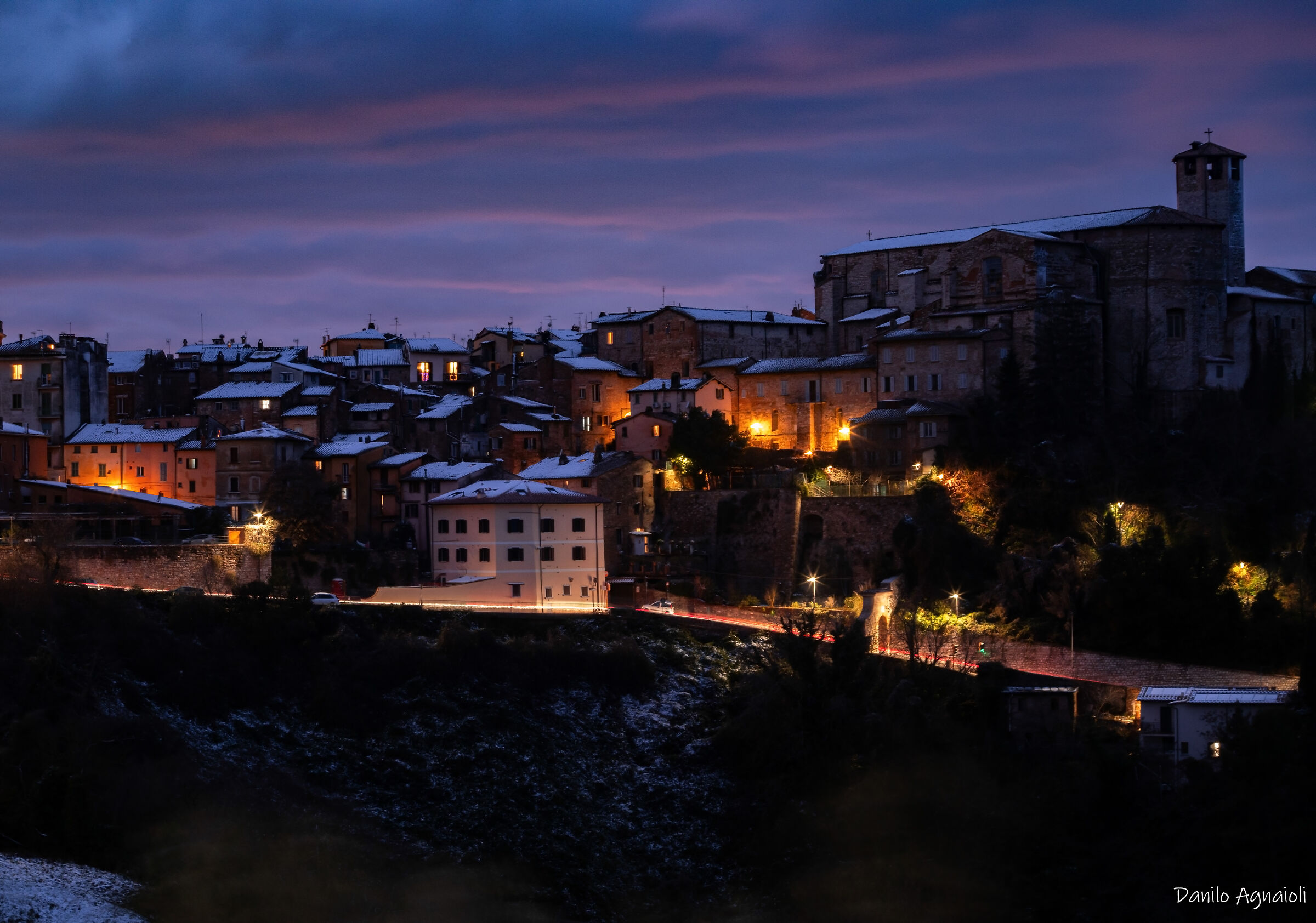 Snow-capped Perugia, a song of lights in the cold