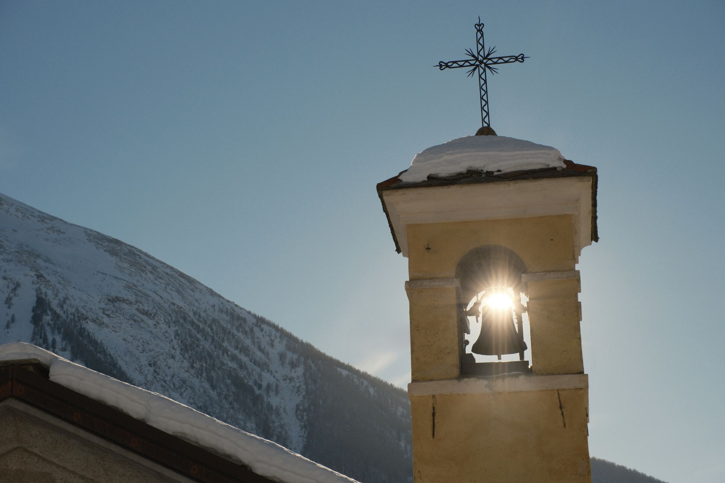 Sunset over the bell tower of Usseaux