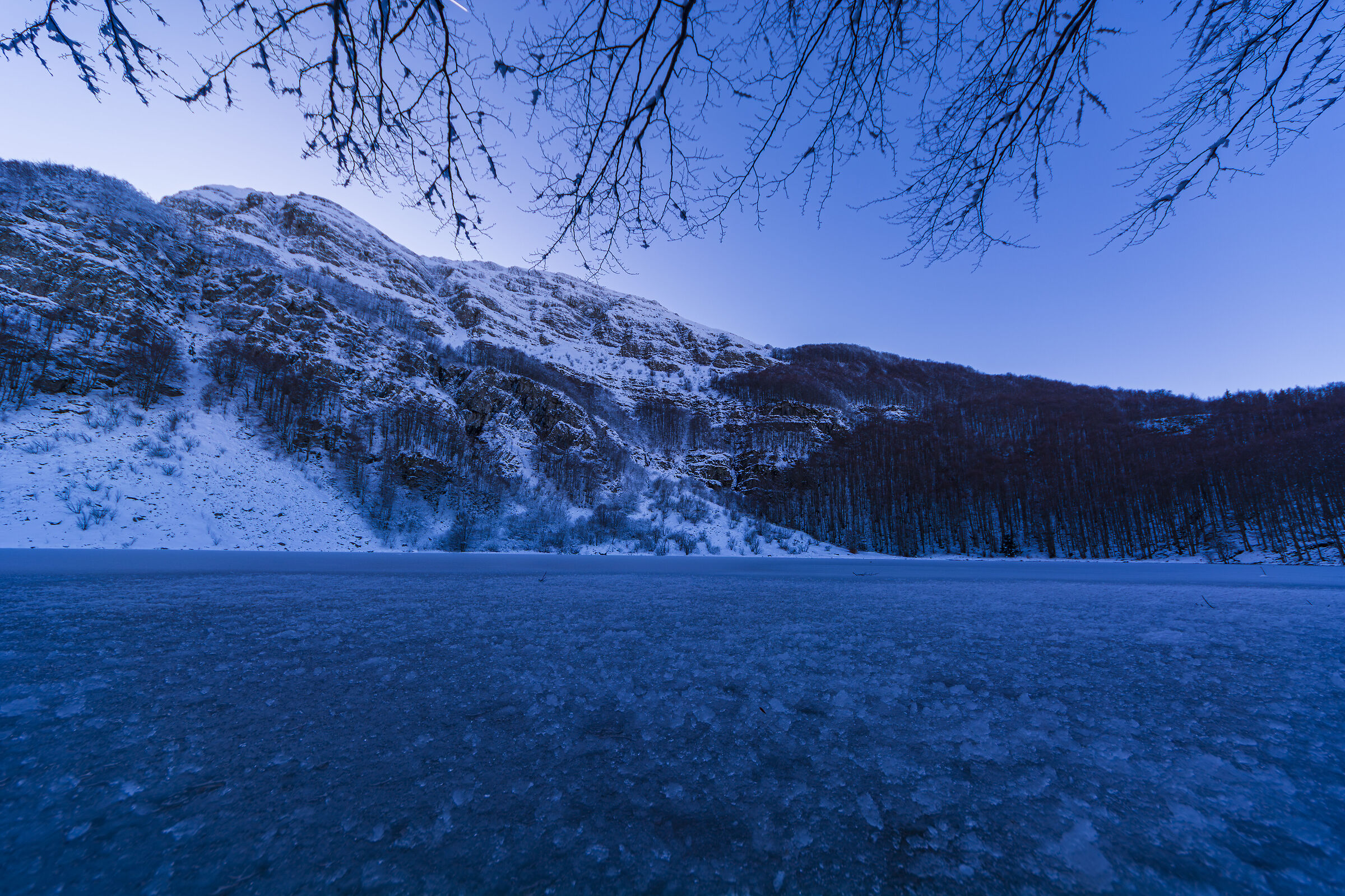 frozen lake at blue hour