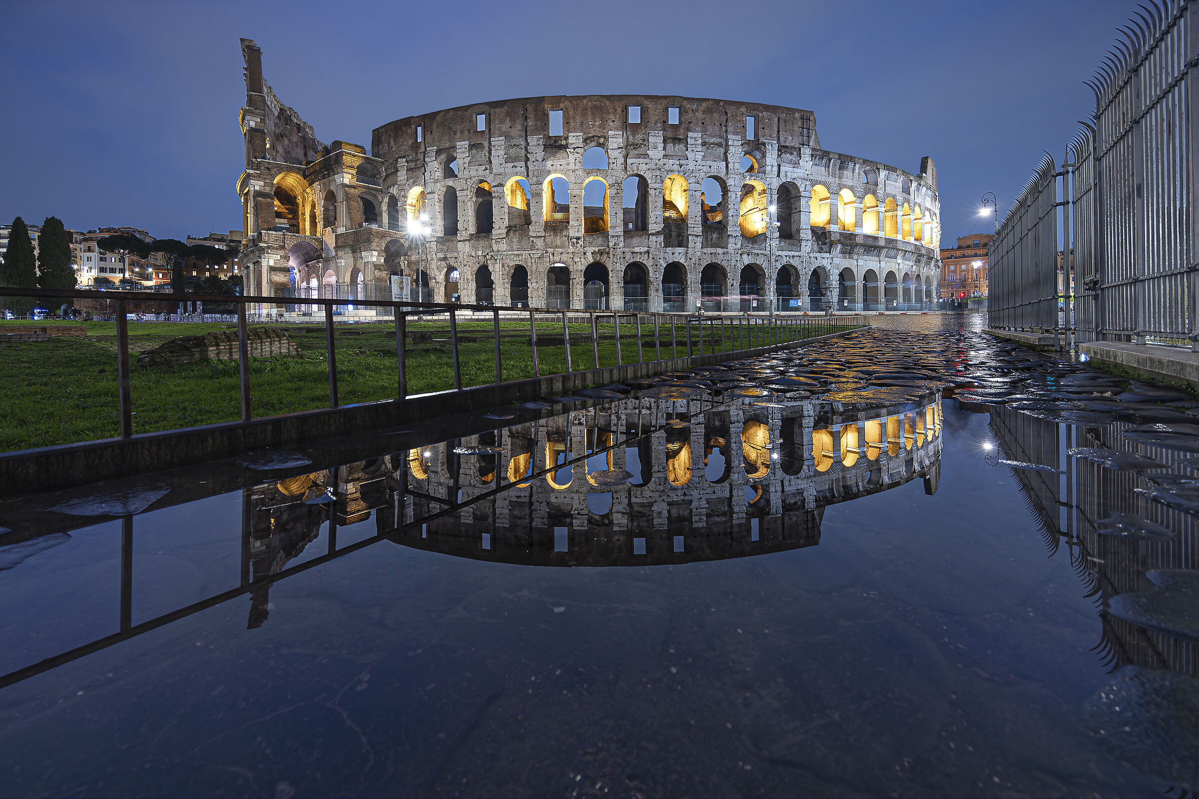 Reflections at the Colosseum on a rainy day