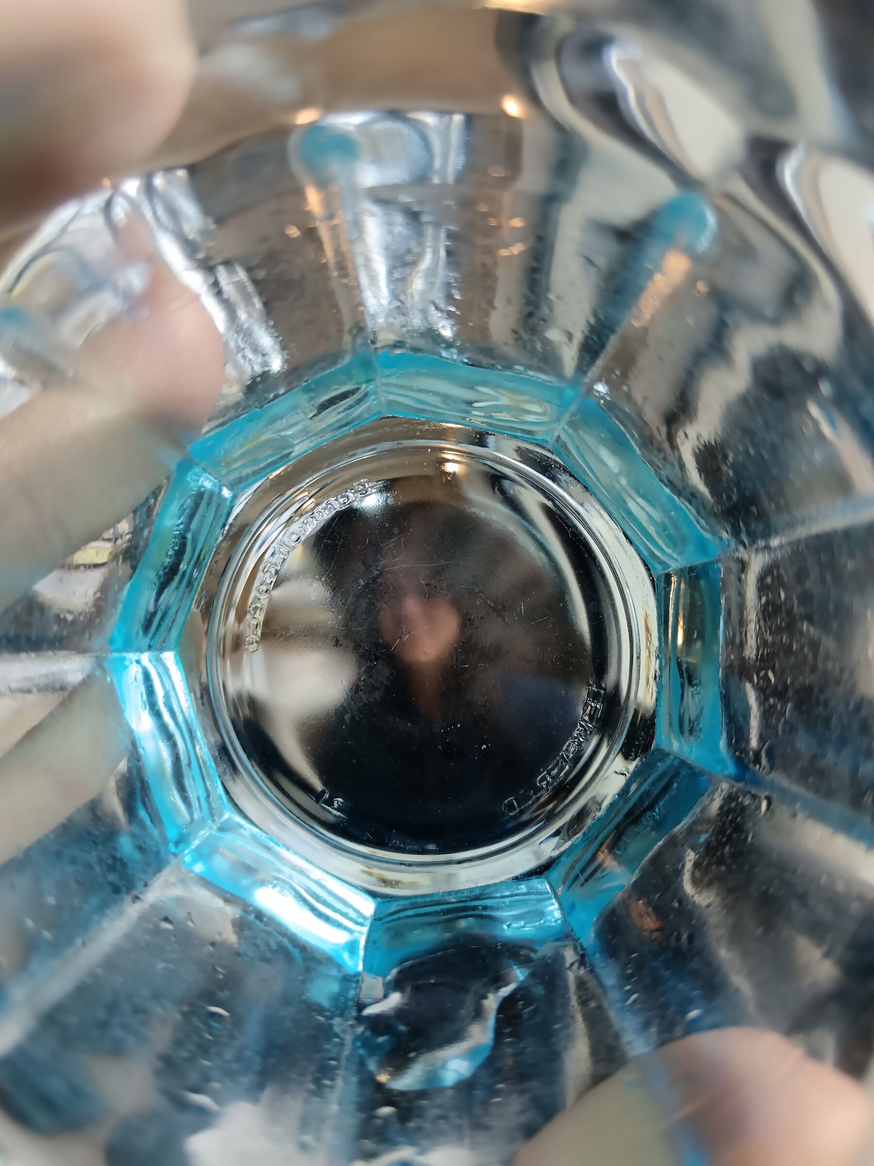 On the bottom of the glass
