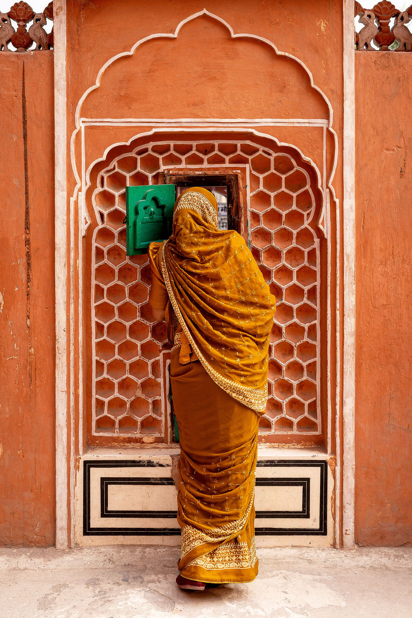 Behind the green window