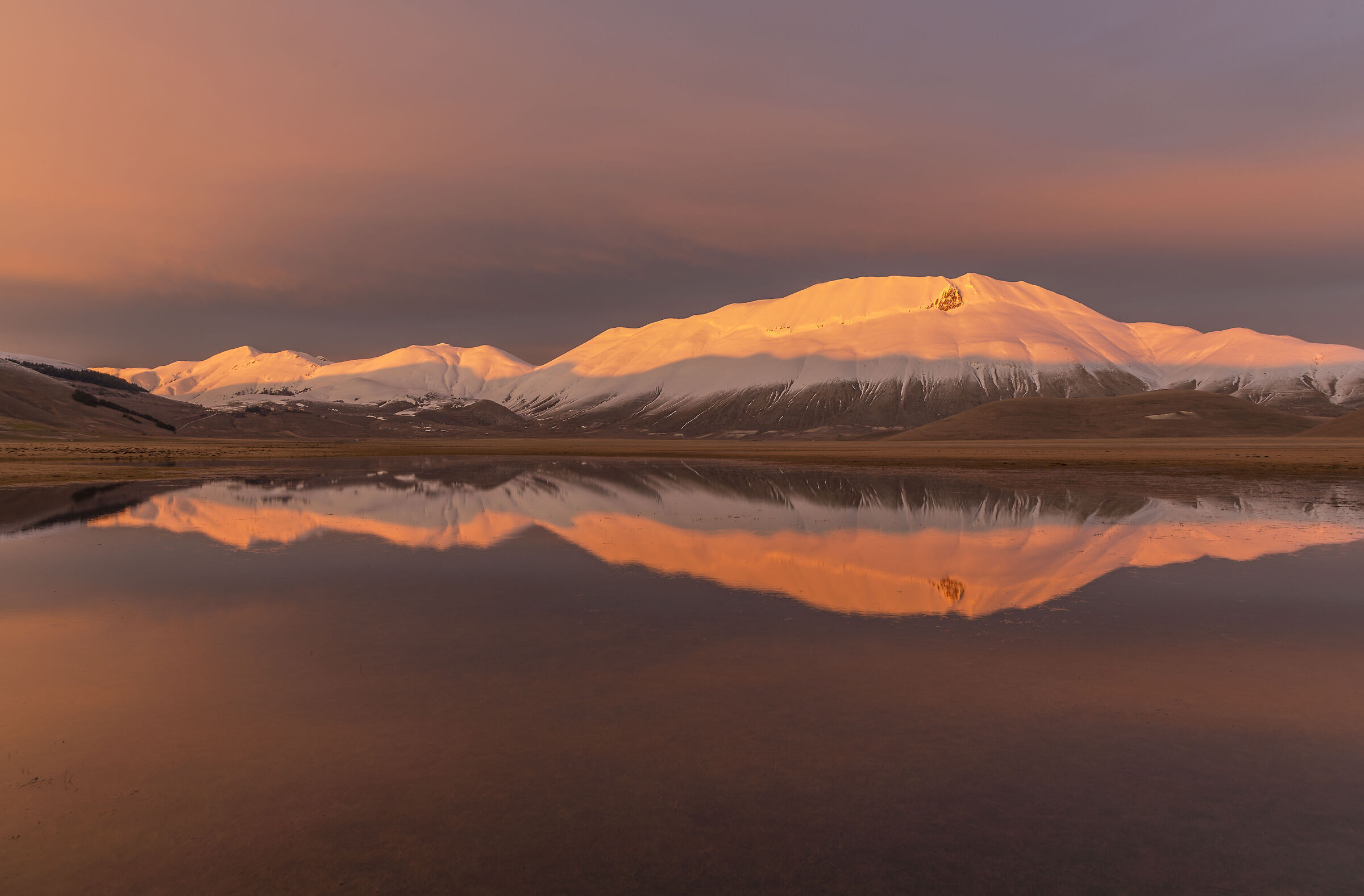 Reflections on the Piano Grande at sunset