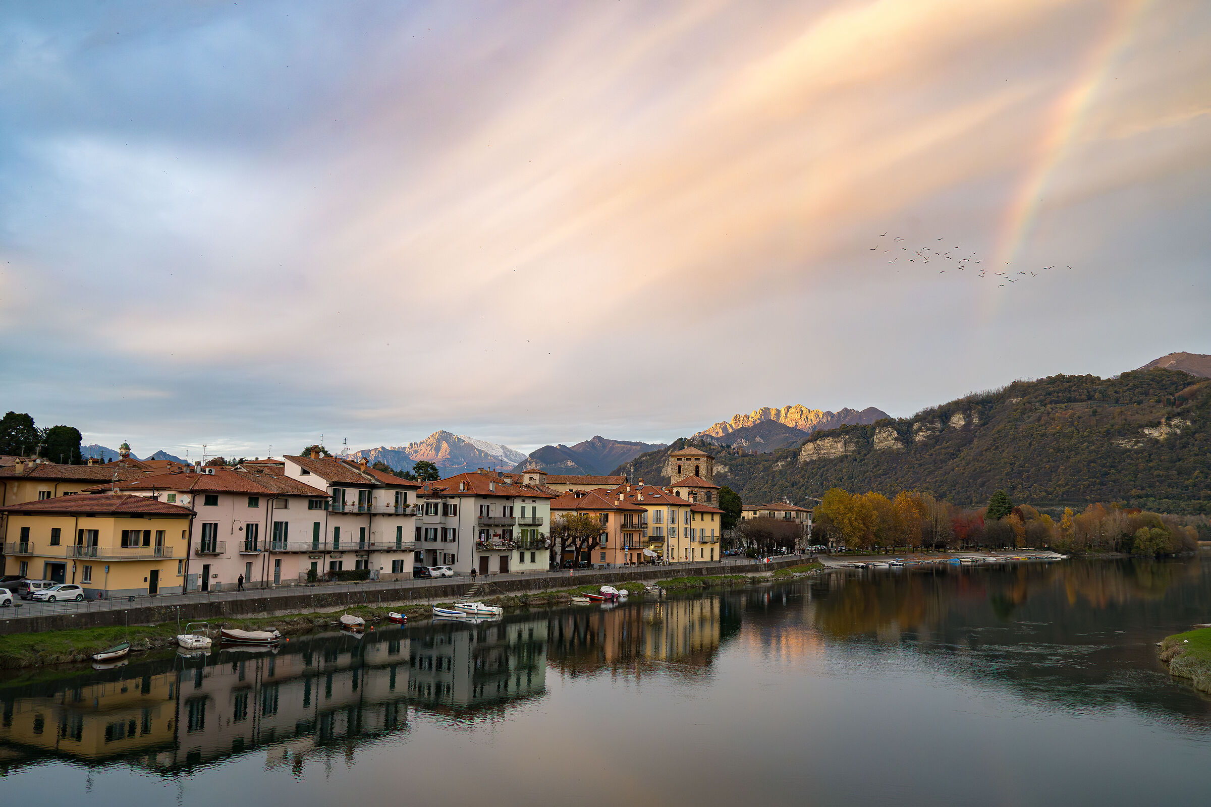 the town of Brivio and the rainbow