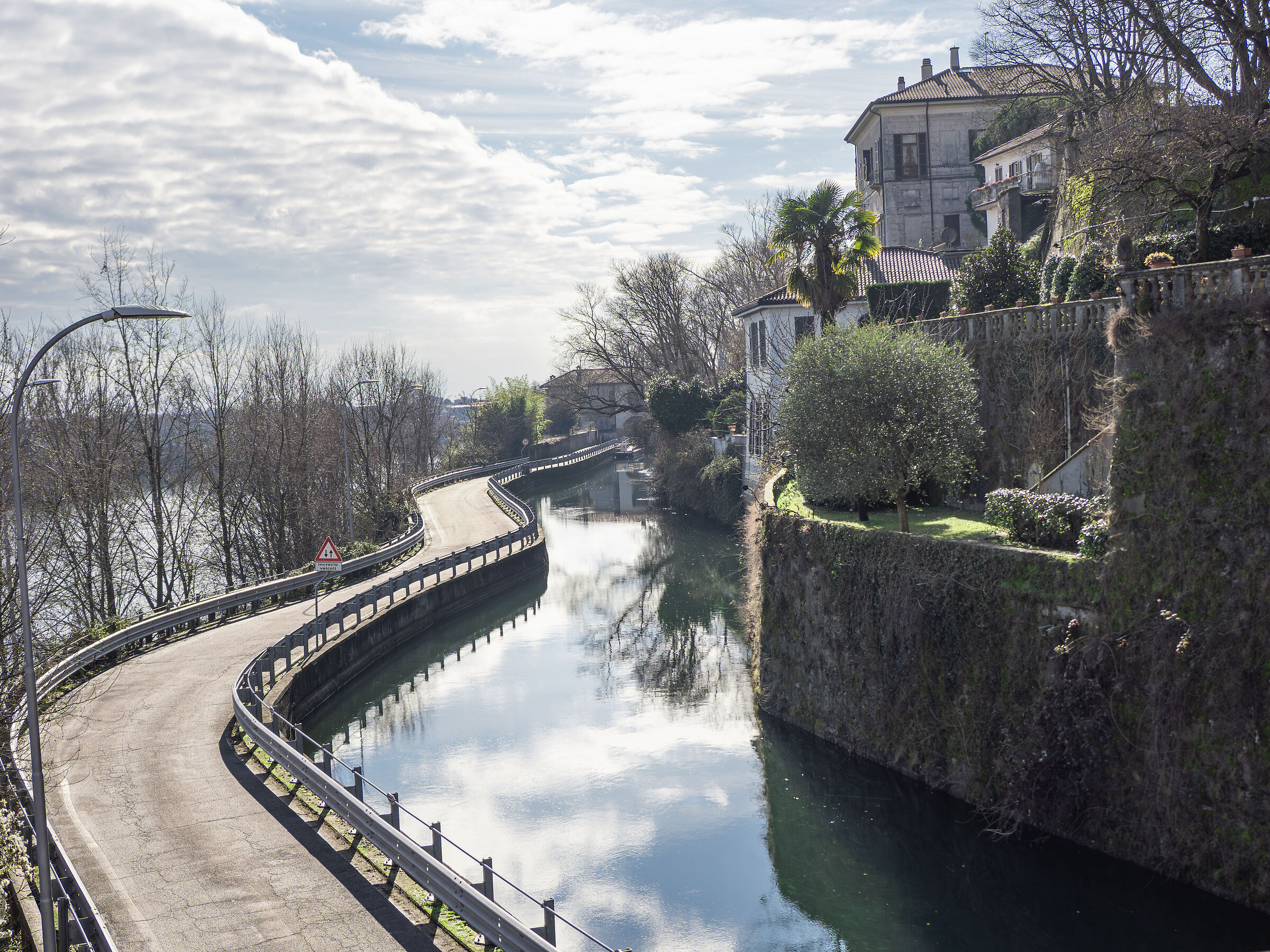 Road between river and canal
