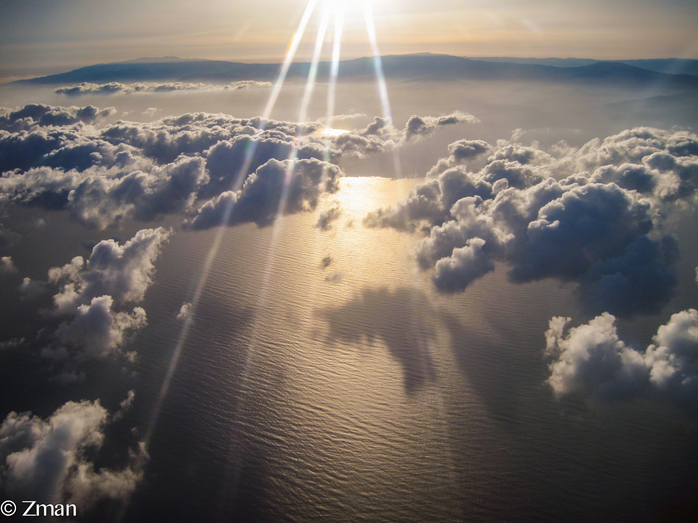 Sky, Sea, And Sun Rays