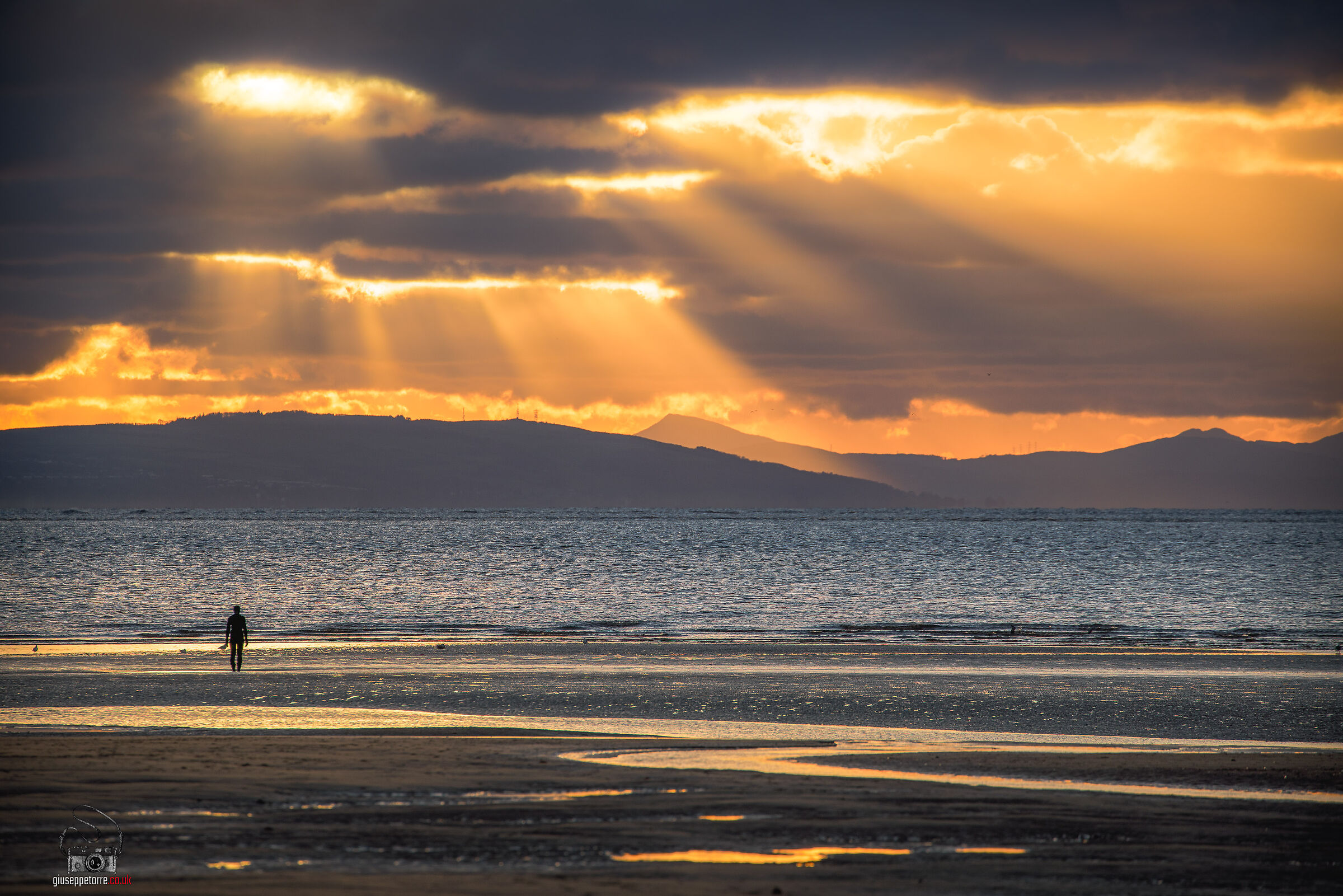 Sotto il viso infuocato