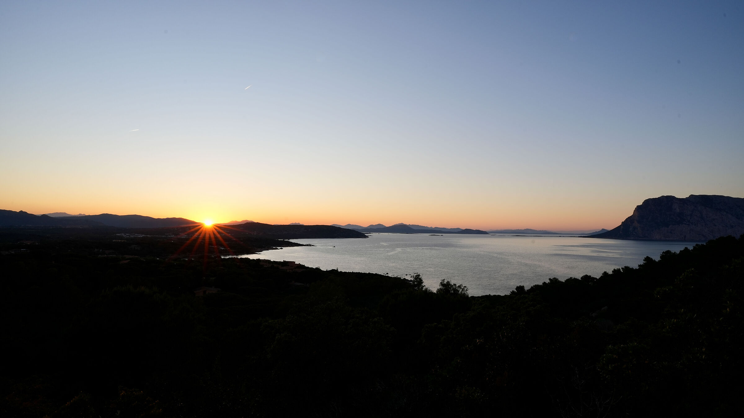 Sunset at Capo Coda Cavallo at the end of April 2