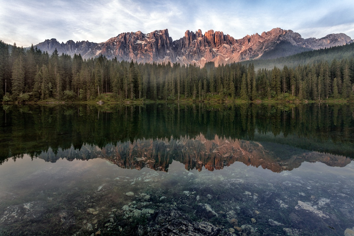 The Latemar, which is mirrored in the lake Carezza