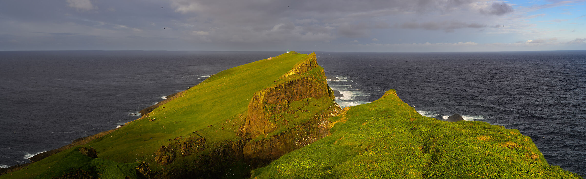 Mykines Lighthouse in the foreground
