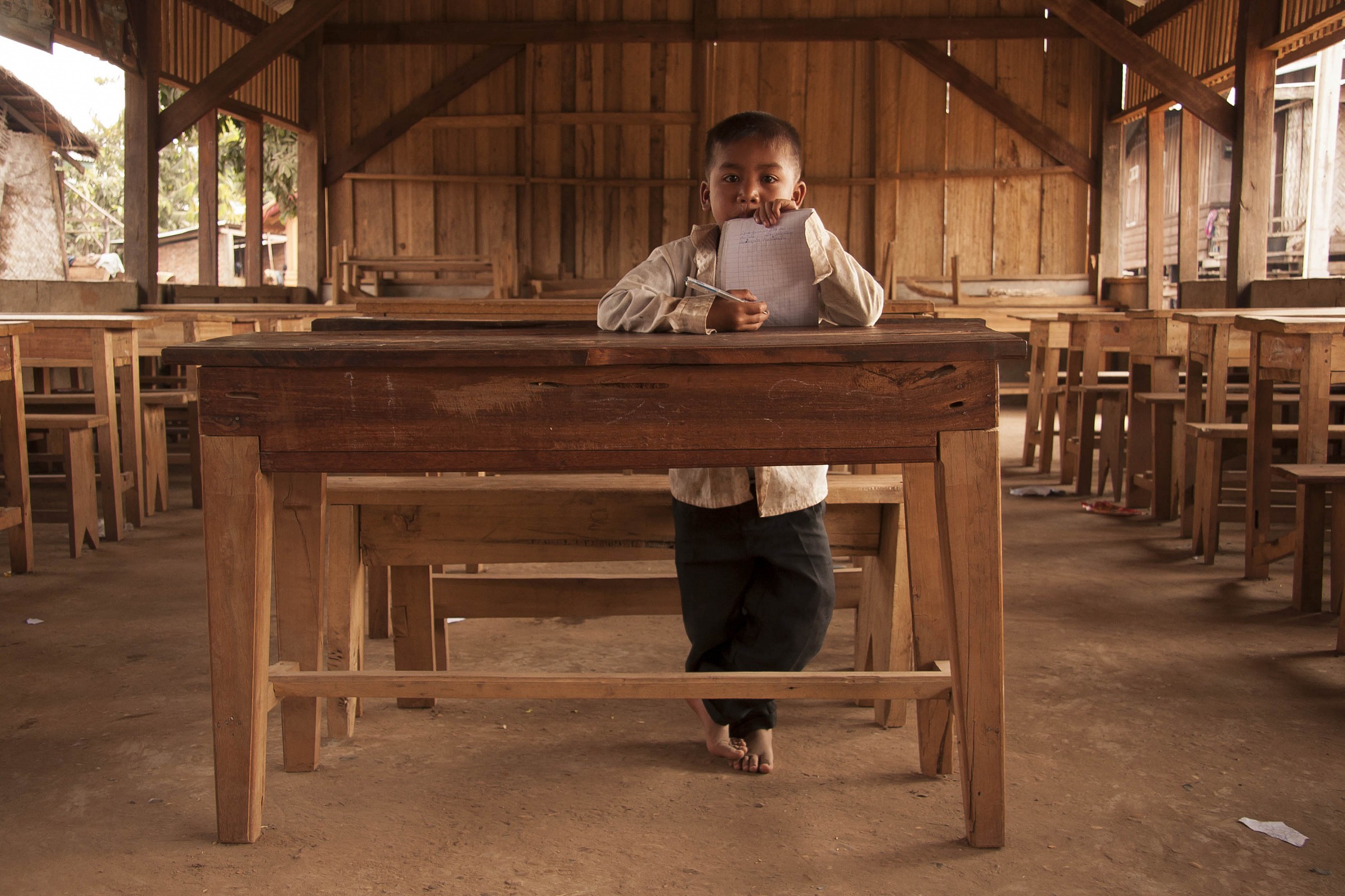 bambino in classe a Tat Lo