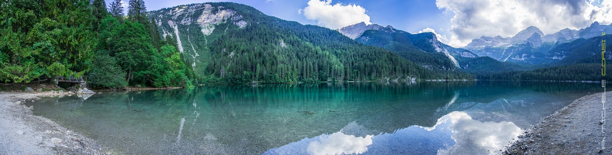 Reflections of forests and mountains in a lake