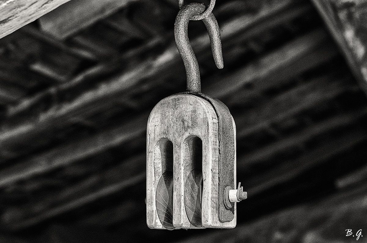 Old pulley carving