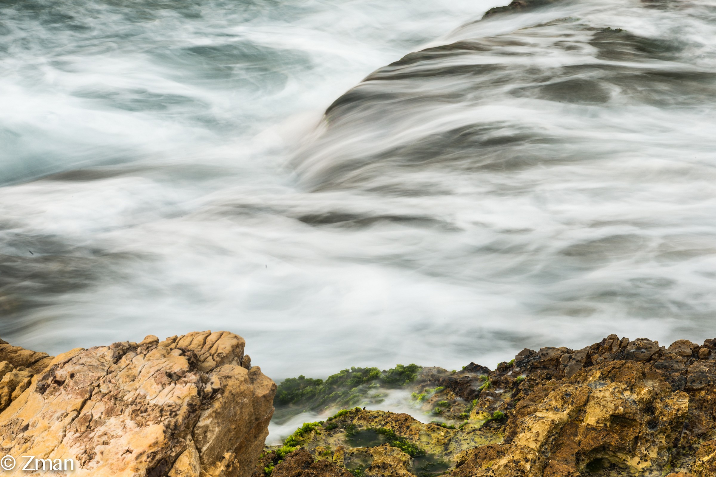 The Alrawshe shore line. Waves breaking on the Rocks