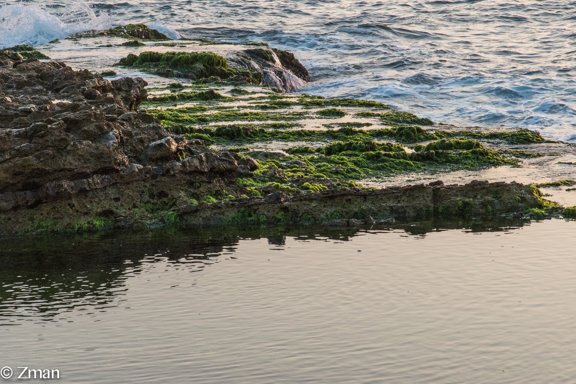 The Alrawshe shore line. Waves breaking on the Rocks