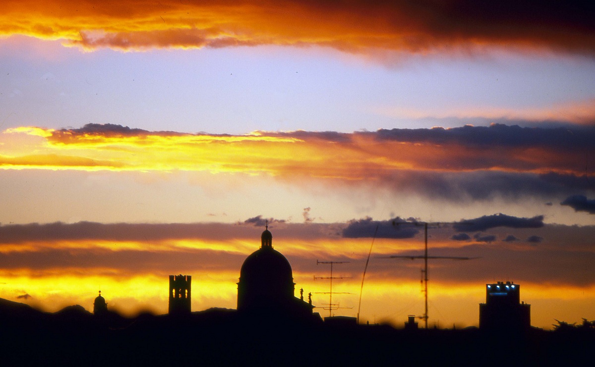 sunset on the background of the cathedral of Brescia