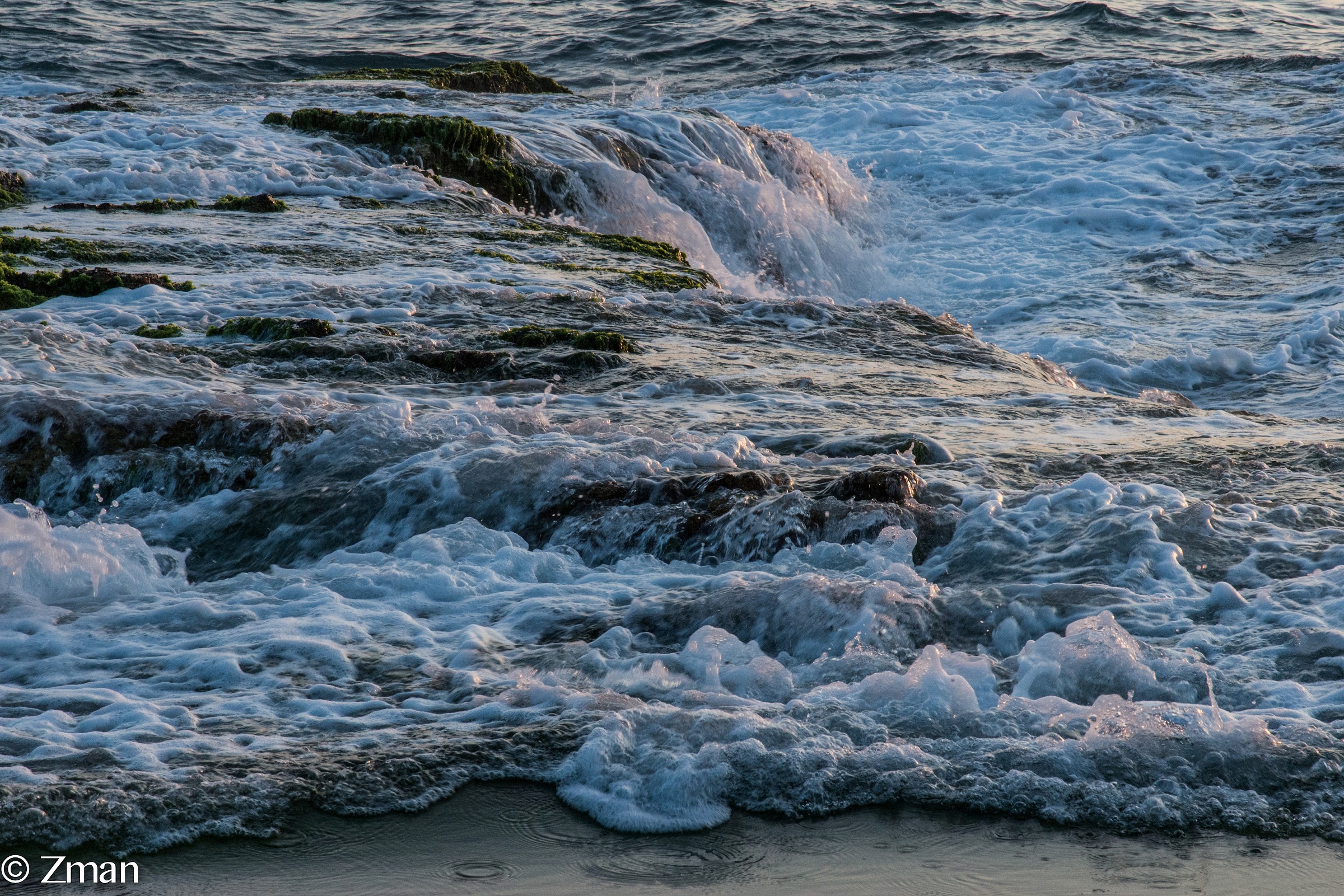 The Alrawshe shore line. Waves breaking on the Rocks