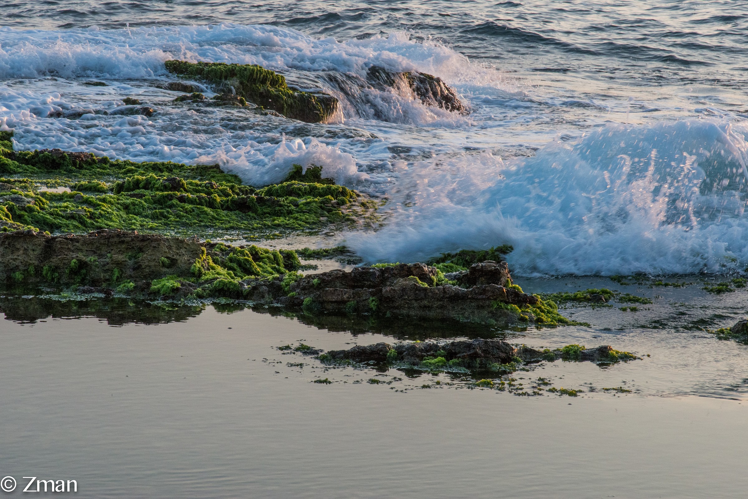 The Alrawshe shore line. Waves breaking on the Rocks