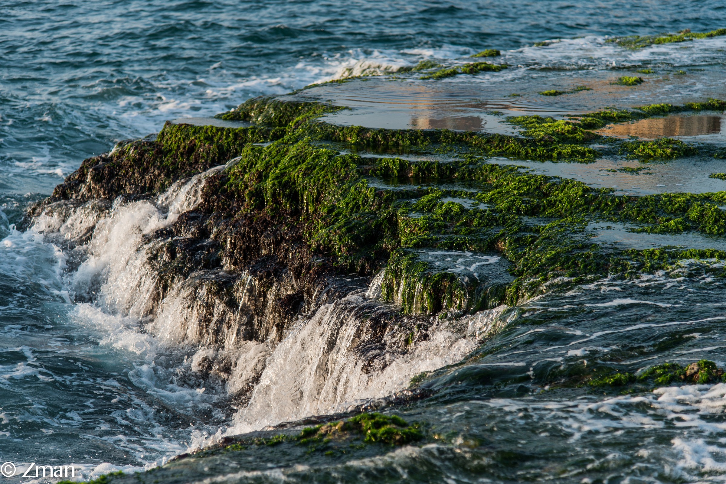 The Alrawshe shore line. Waves breaking on the Rocks