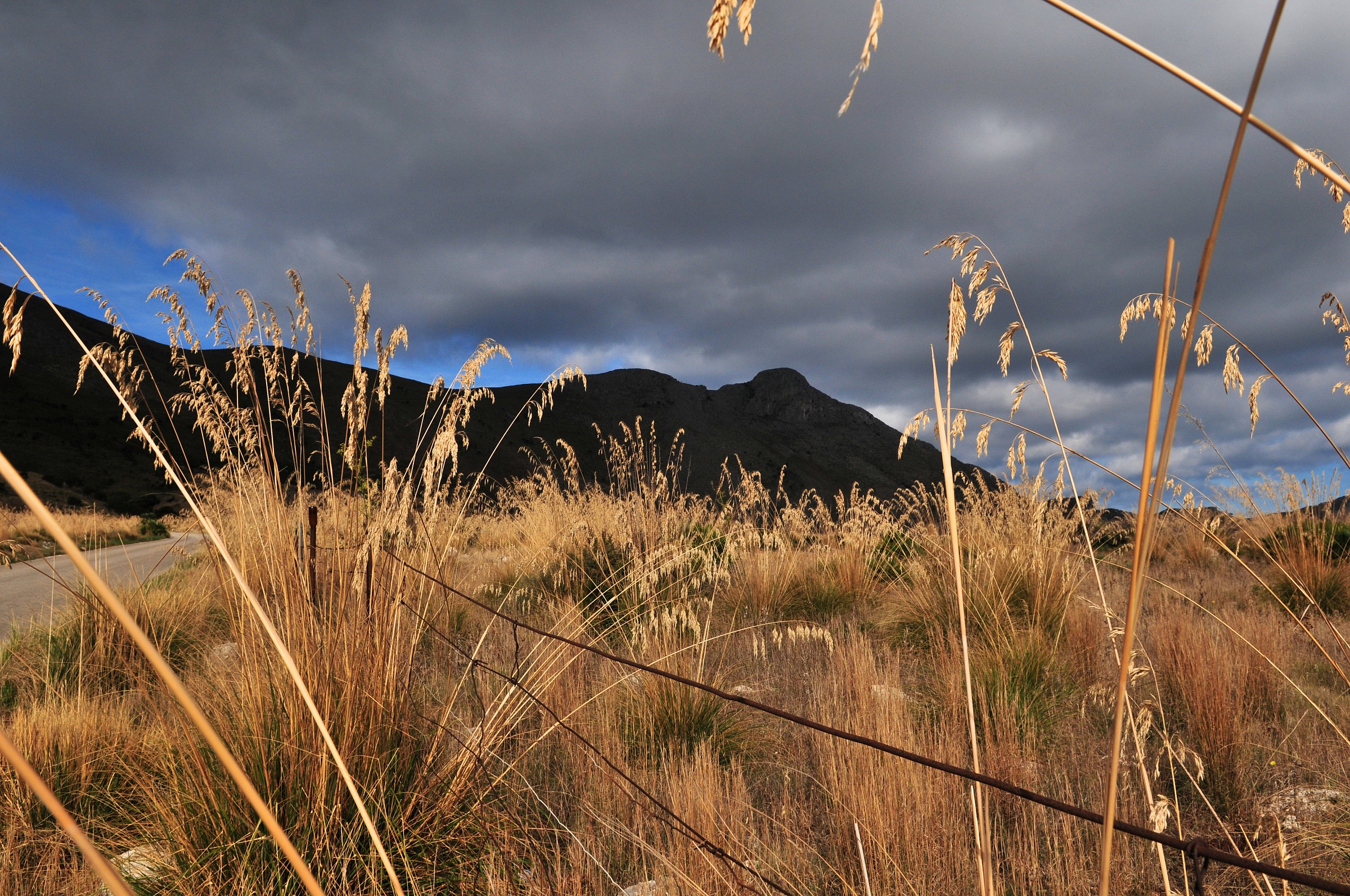 Zingaro Nature Reserve - sun and dark clouds