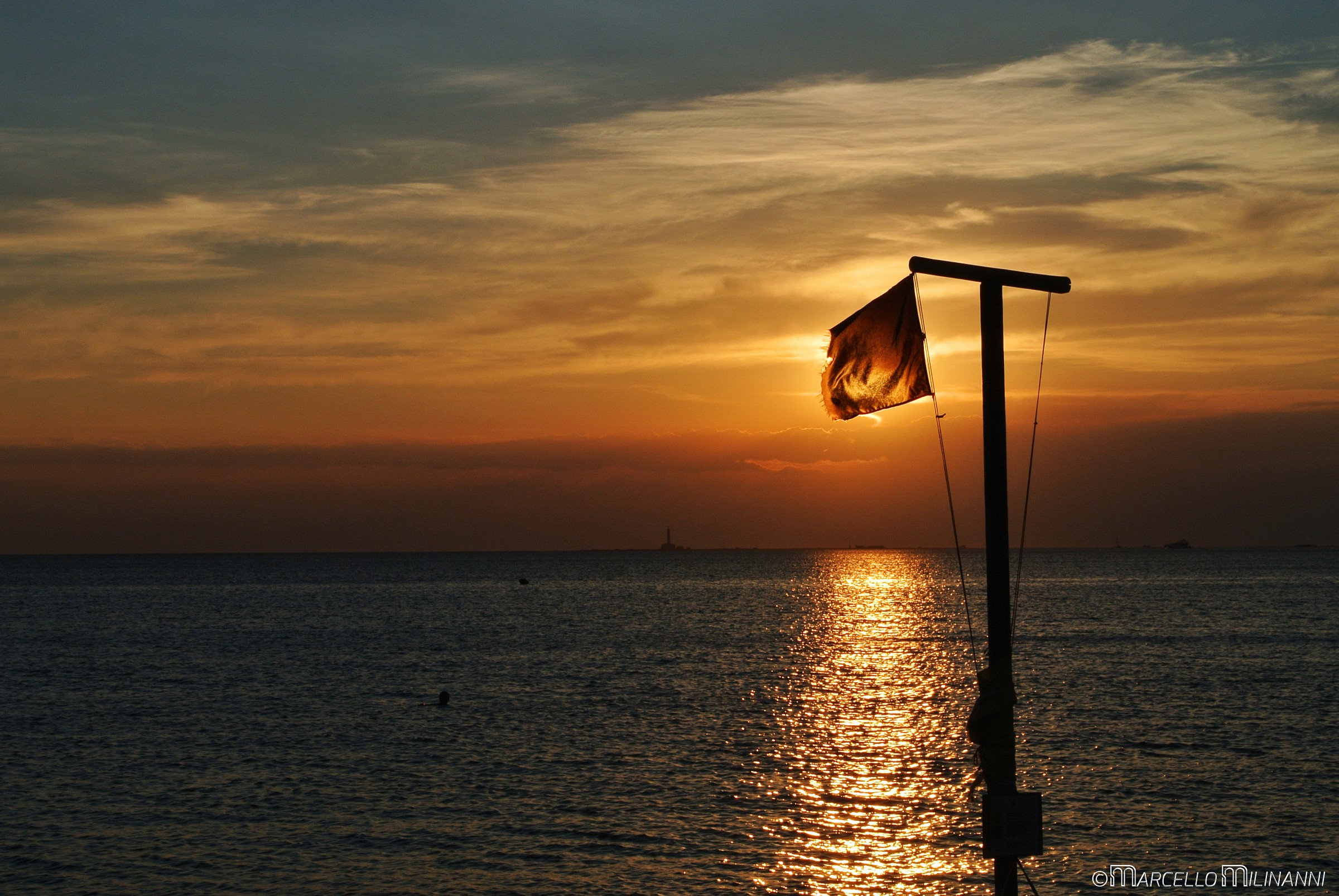 sunshine behind the flag
